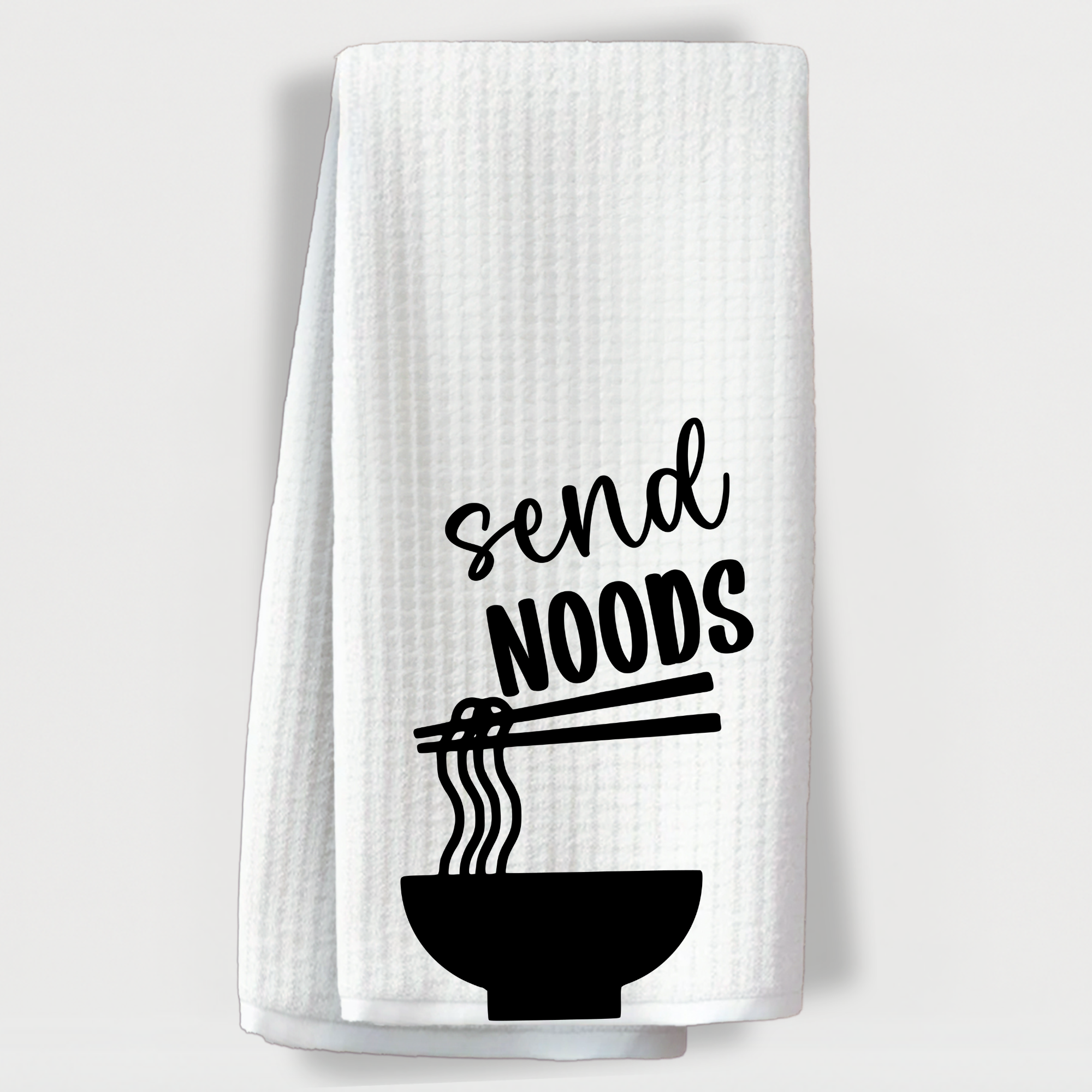 Noodle pun towel with chopsticks and bowl graphic, “Send noods.”