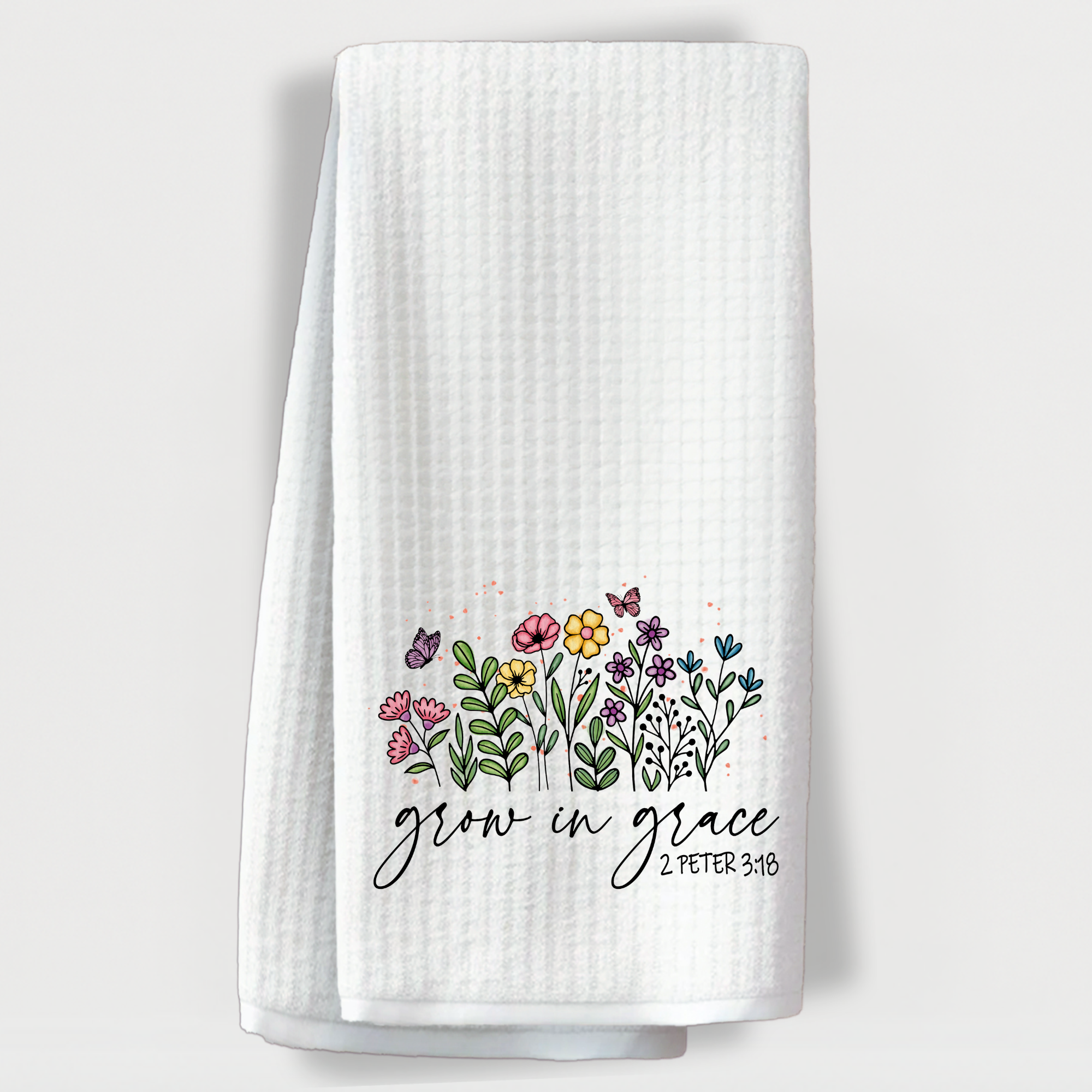 “Grow in Grace” floral kitchen towel for Christian homes.