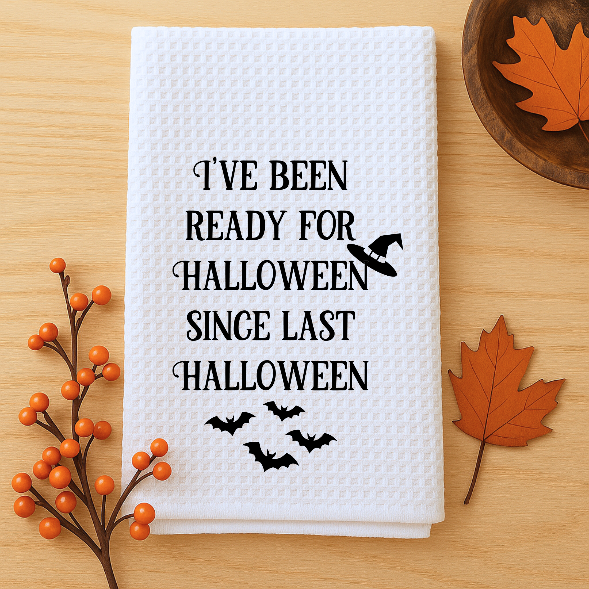 Spooky season waffle weave towel with bats, perfect Halloween housewarming gift.