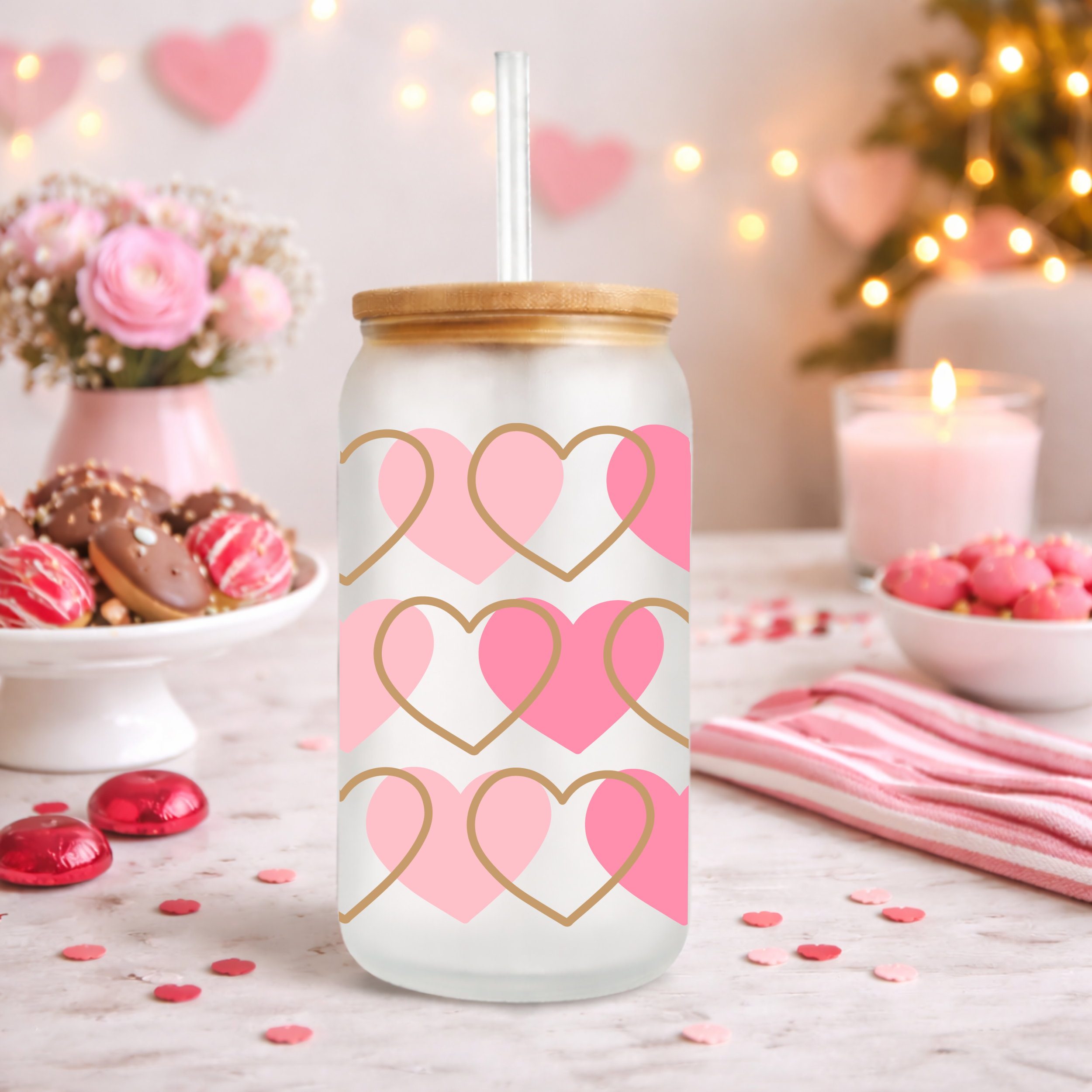 Photo 8 of a frosted Libbey glass can with pink and gold hearts styled with candles and Valentine sweets.