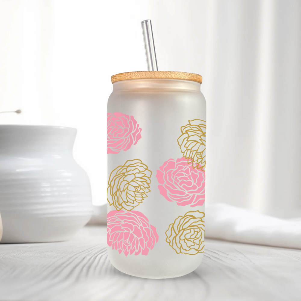 Eco-friendly 16oz glass can tumbler with pink peonies and bamboo lid, styled with white ceramic vase.
