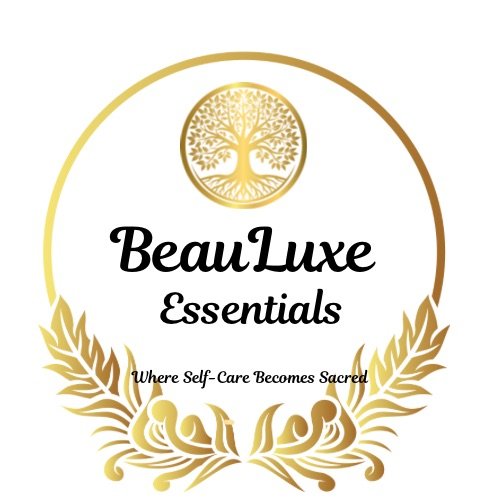 BeauLuxe Essentials logo with a gold tree symbol, gold decorative leaves, and the tagline 'Where Self-Care Becomes Sacred'.