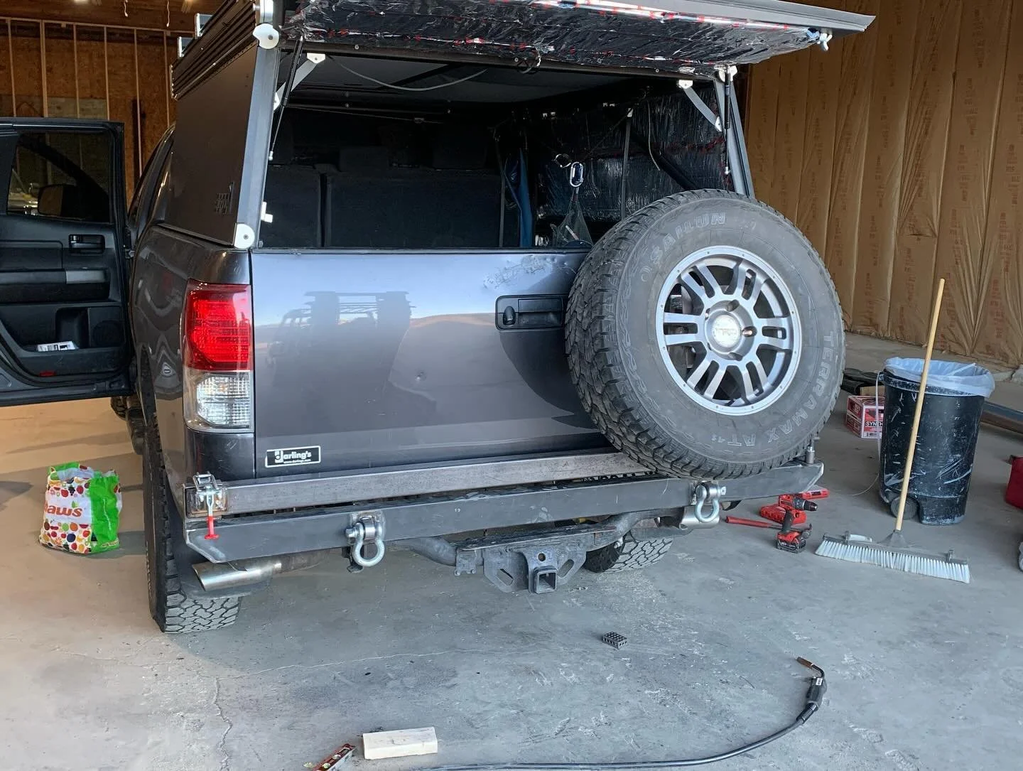 Customer wanted a swing out bumper/tire carrier for his overland adventures. He brought us the idea and we made it happen. Plans are to add a folding table and some finishing touches in the future to give him a place to cook and tailgate. The shop is