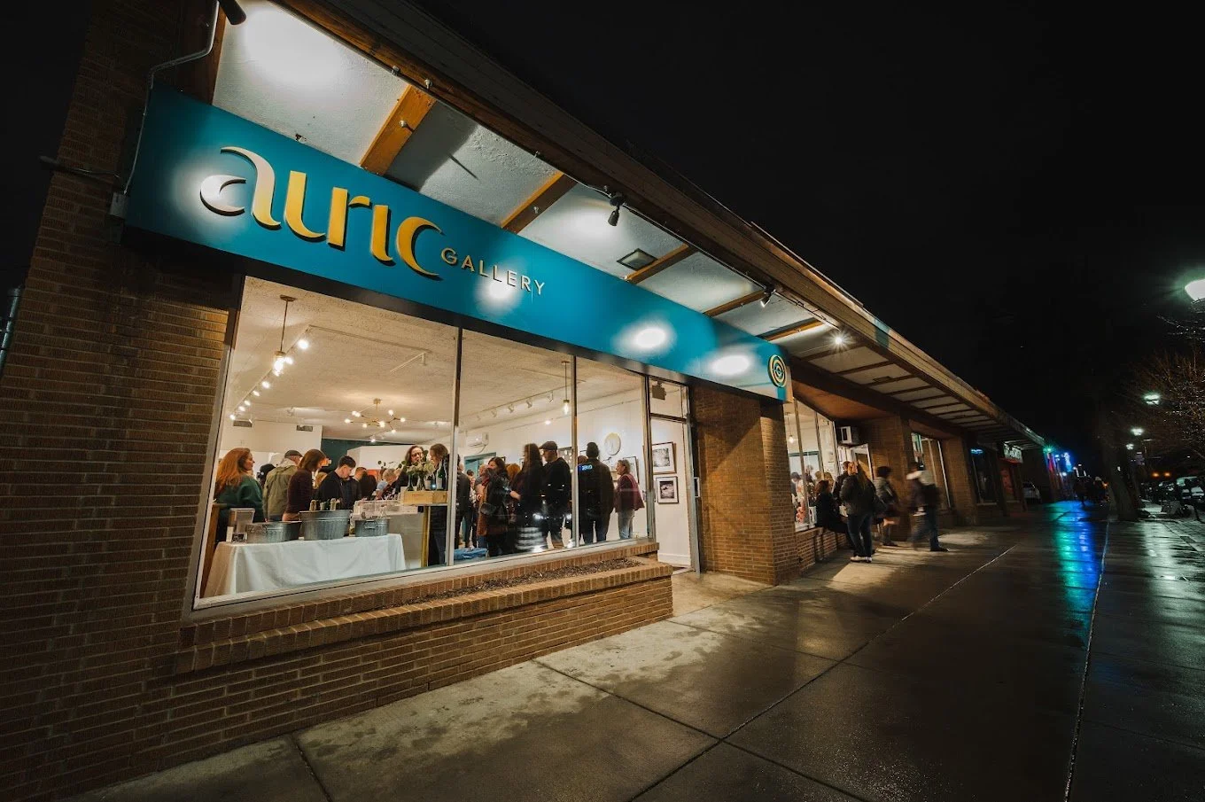 Night view of 'AURIC GALLERY' in downtown Colorado Springs, CO.