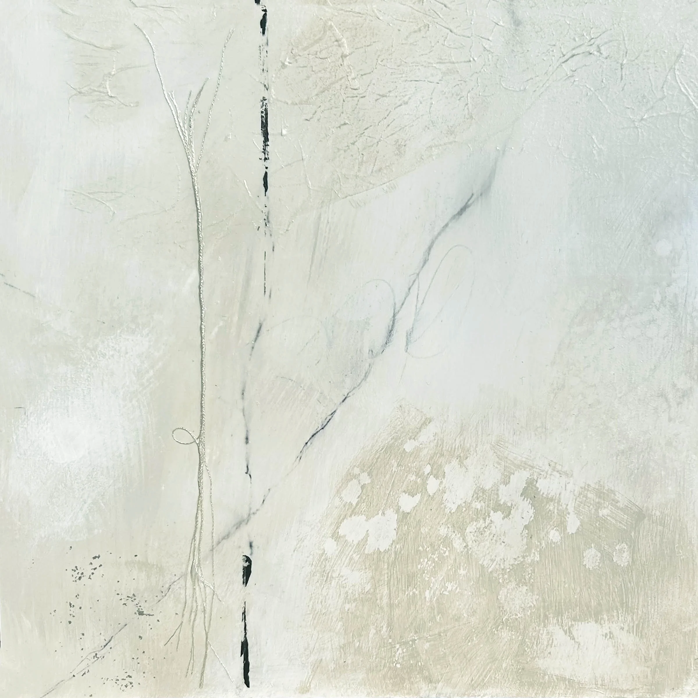 Close-up of a textured wall with cracks and marks.