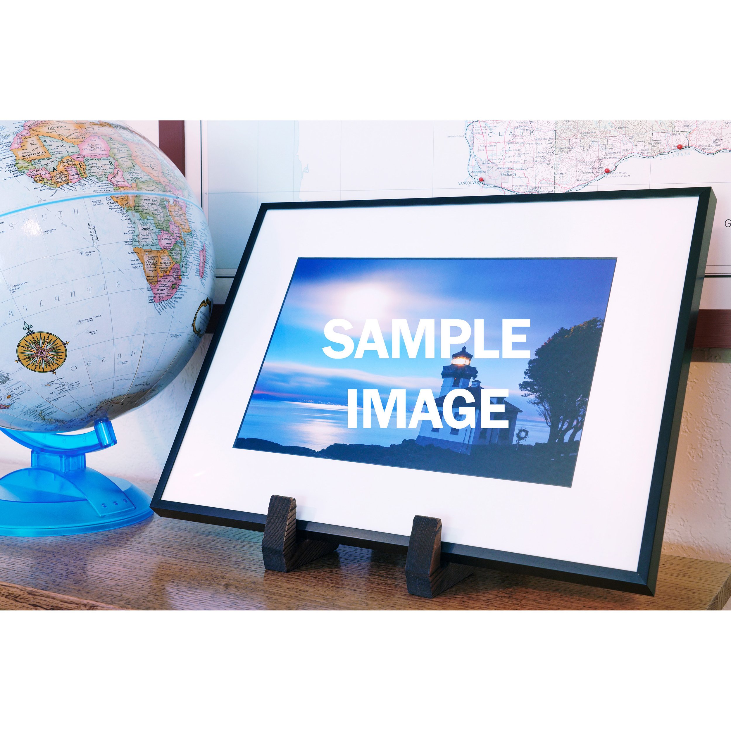 12x16 black aluminum frame for 8X12 print on table