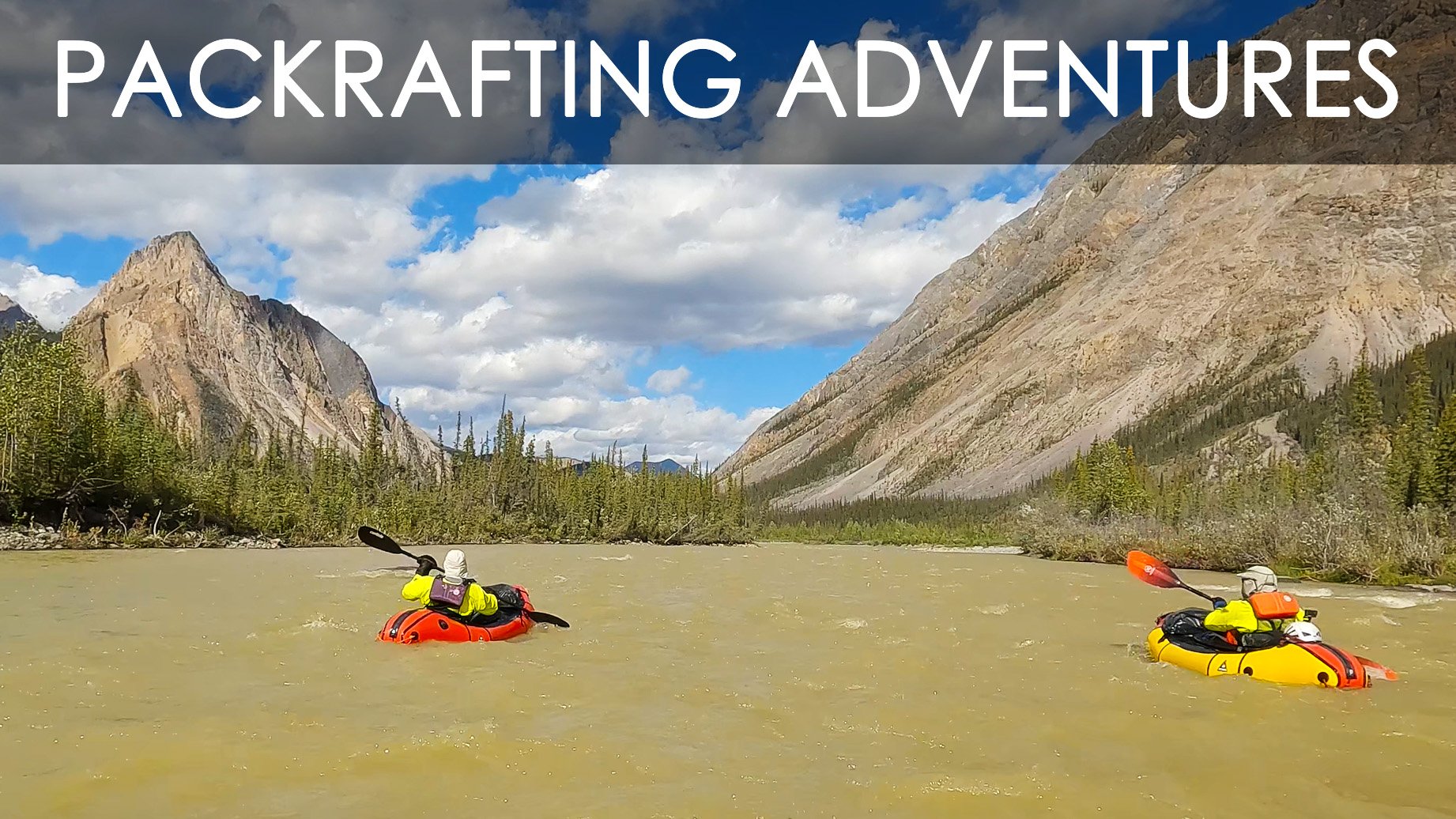Two people kayaking on a river surrounded by mountains and forest, with a partly cloudy sky.