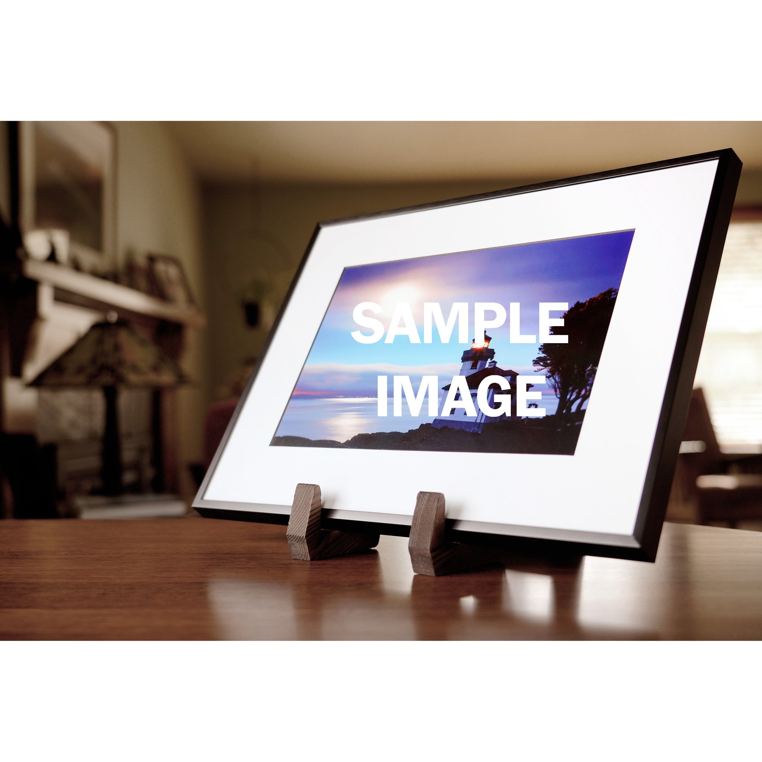 12x16 black aluminum frame for 8X12 print on table