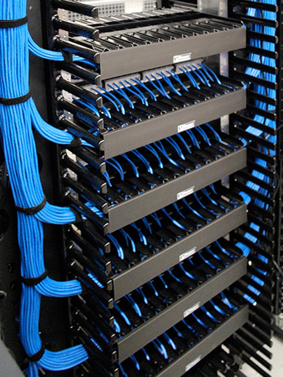 Server rack with organized blue network cables