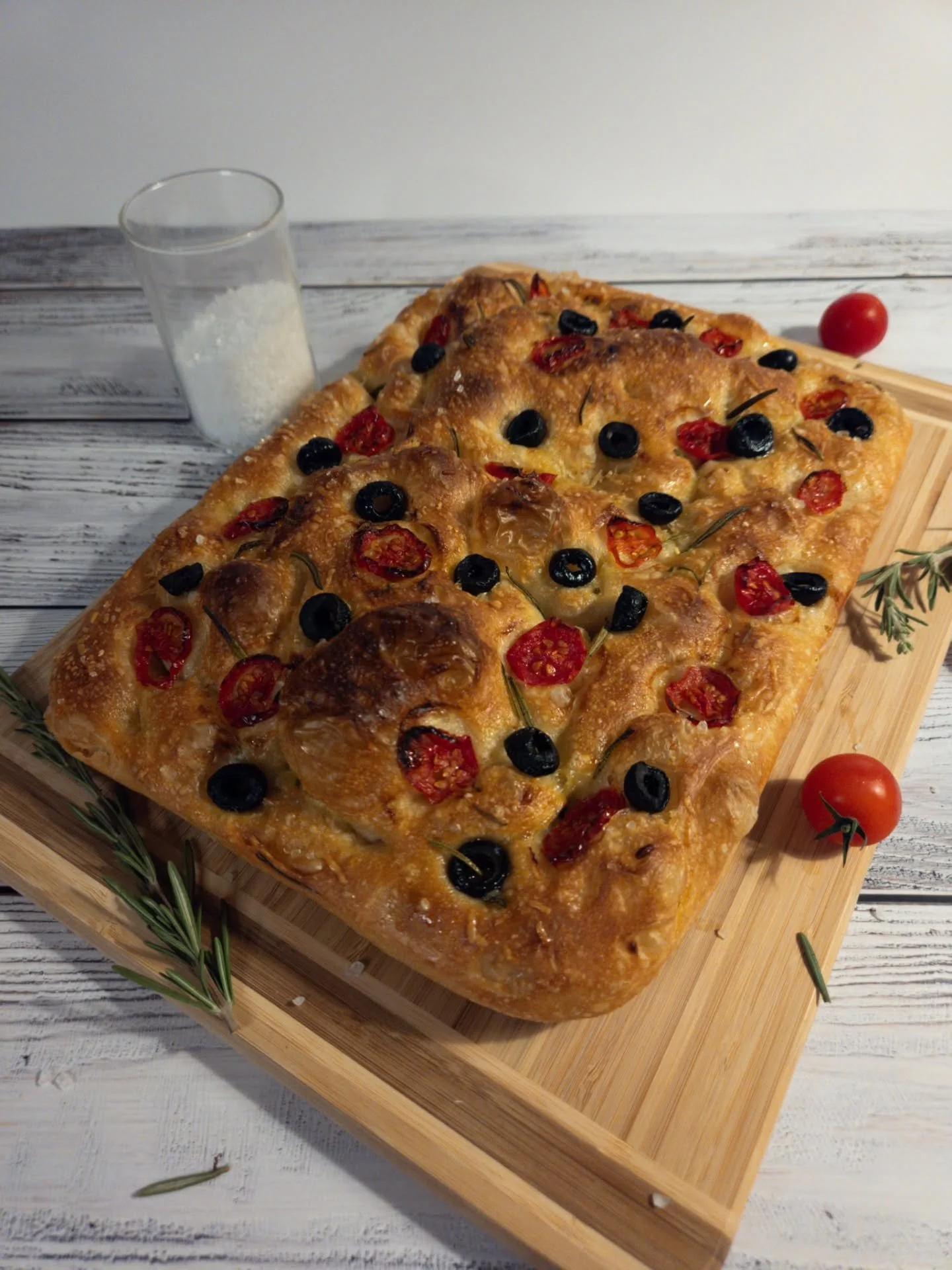 Focaccia with toppings - another popular piece from my little bakery 😁 it usually contains cherry tomatoes, black olives, parmesan and of course, rosemary. I like making these highly hydrated puffy airy focaccias in opposite to the flatter version, 