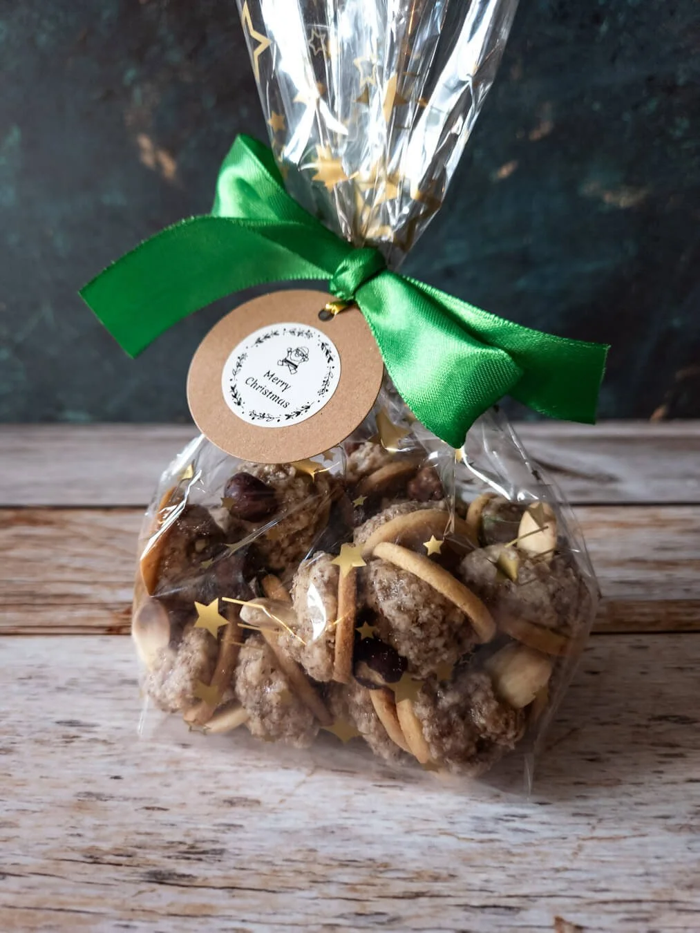 Handmade hazelnut macaron cookies from Zurich — rich Nussmakronen with shortcrust base and whole hazelnut topping, traditional Swiss Christmas treat.