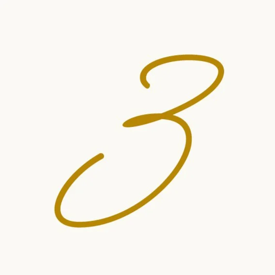 Stylized gold number three on a light background.