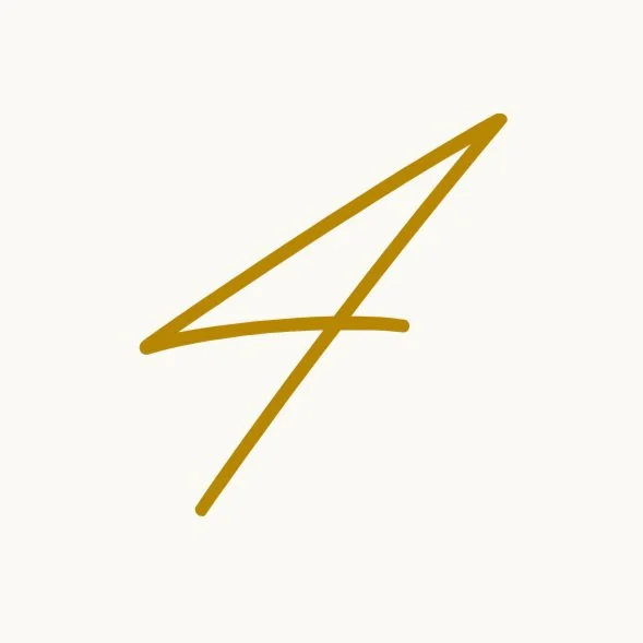 A stylized, handwritten number four in gold color on a light background.