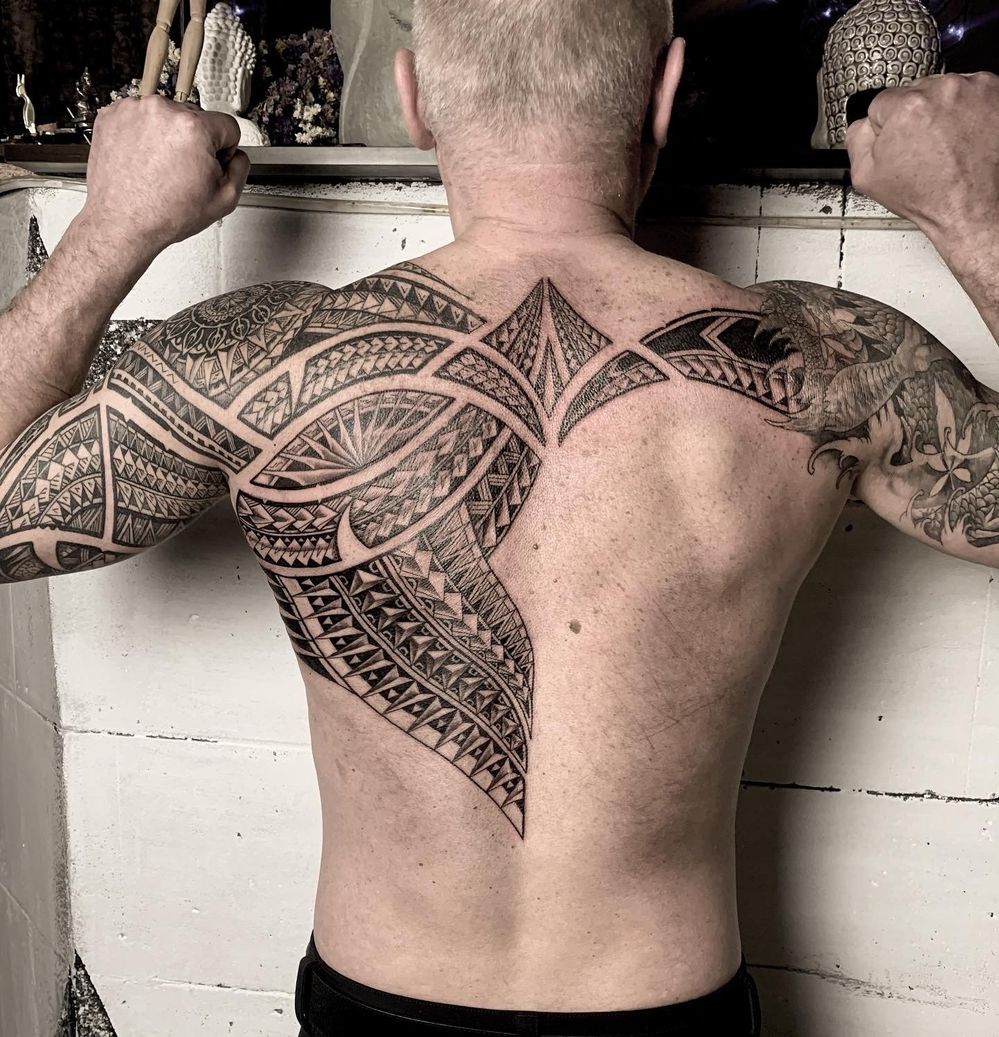 maori back tattoo