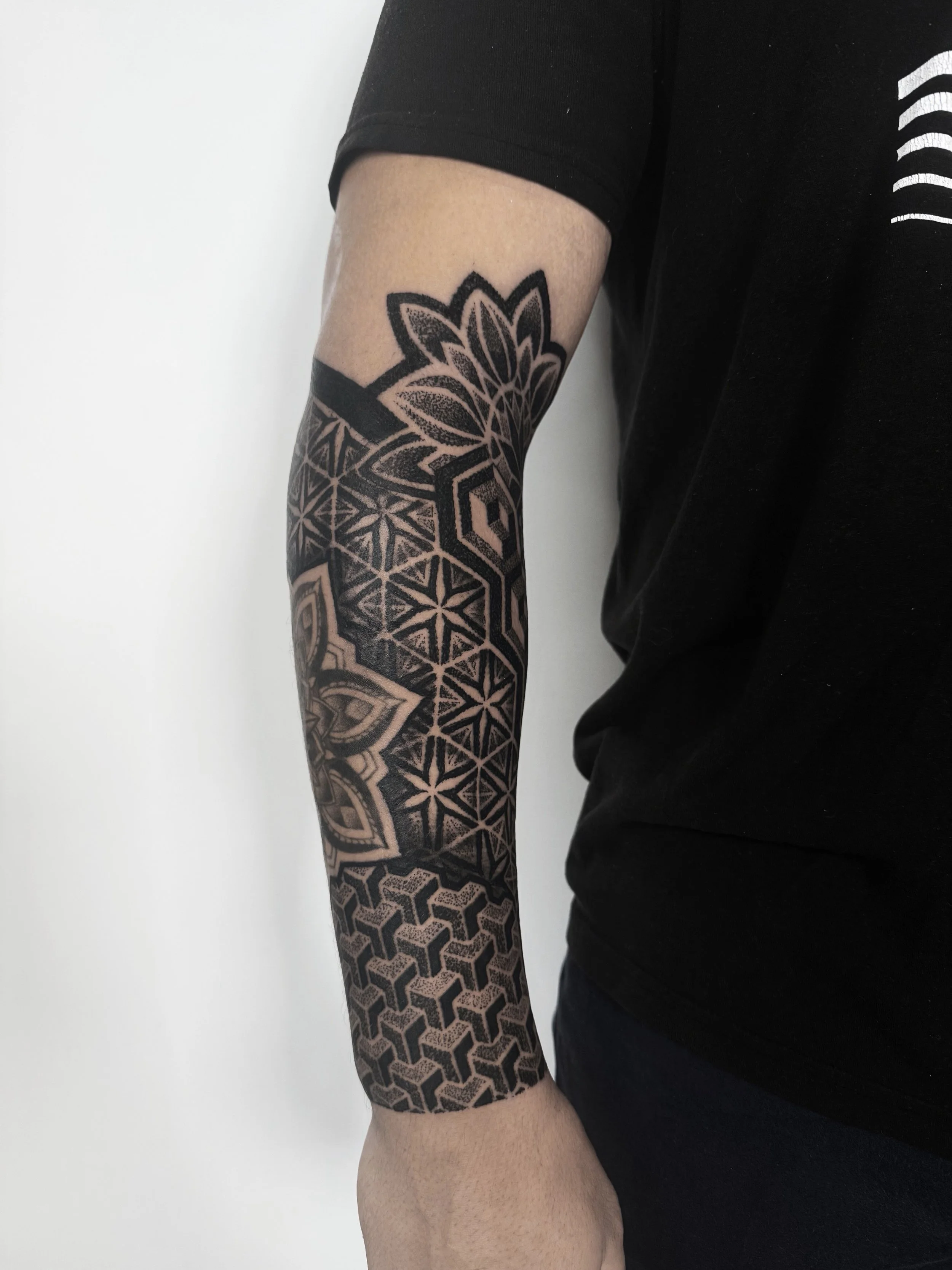 geometry dotwork sleeve tattoo