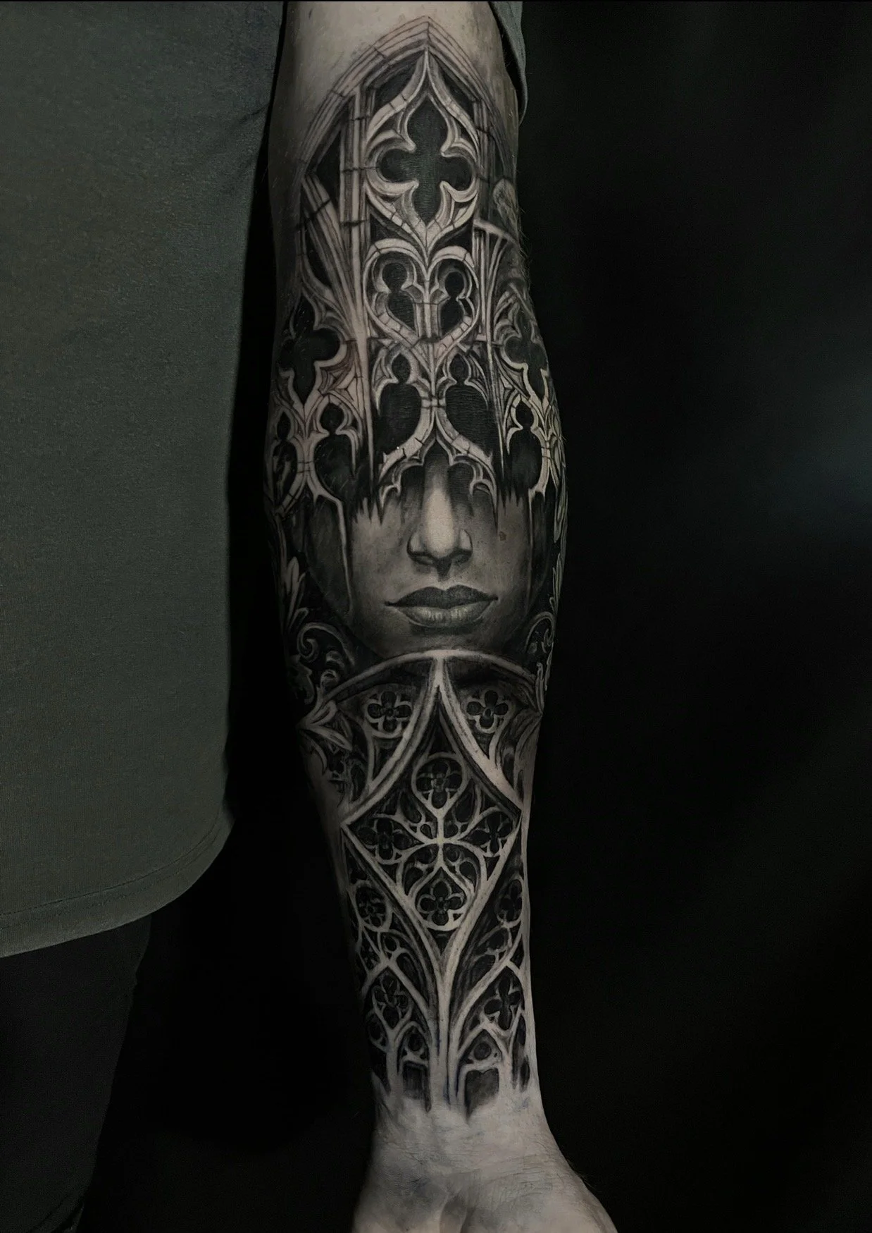 black and grey gothic portrait tattoo