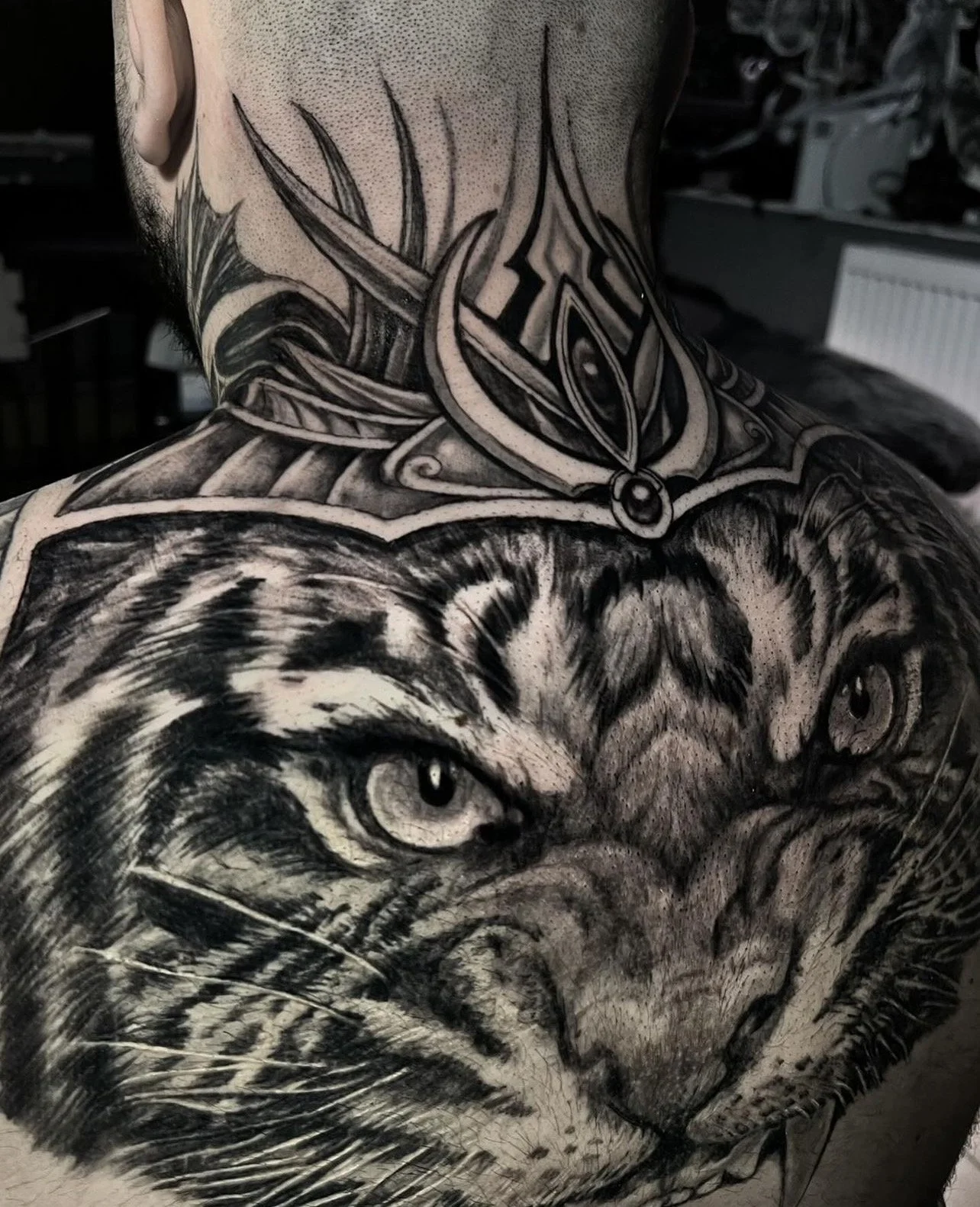 black and gray tiger back tattoo