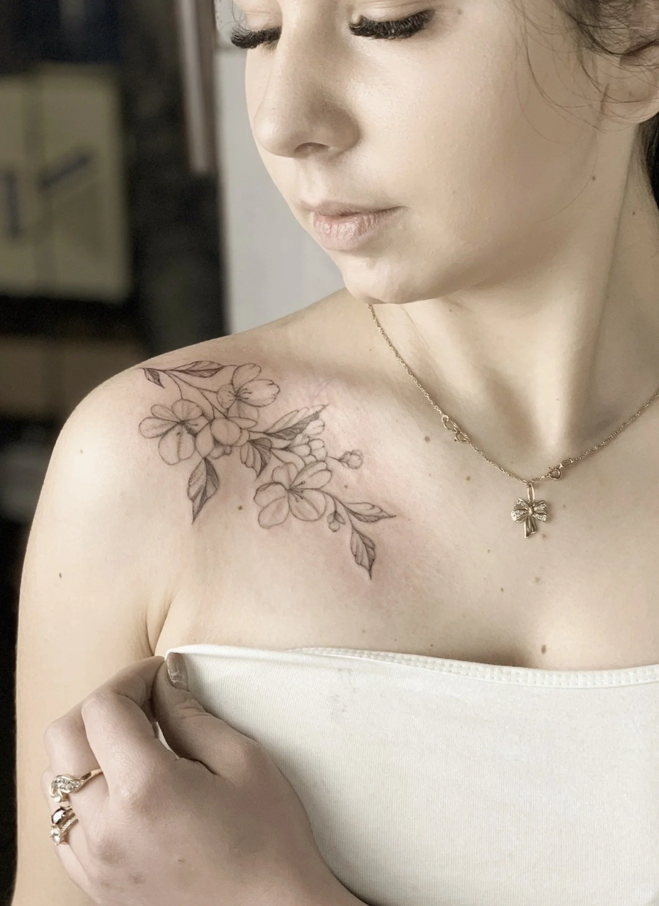 fine line tattoo on colarbone