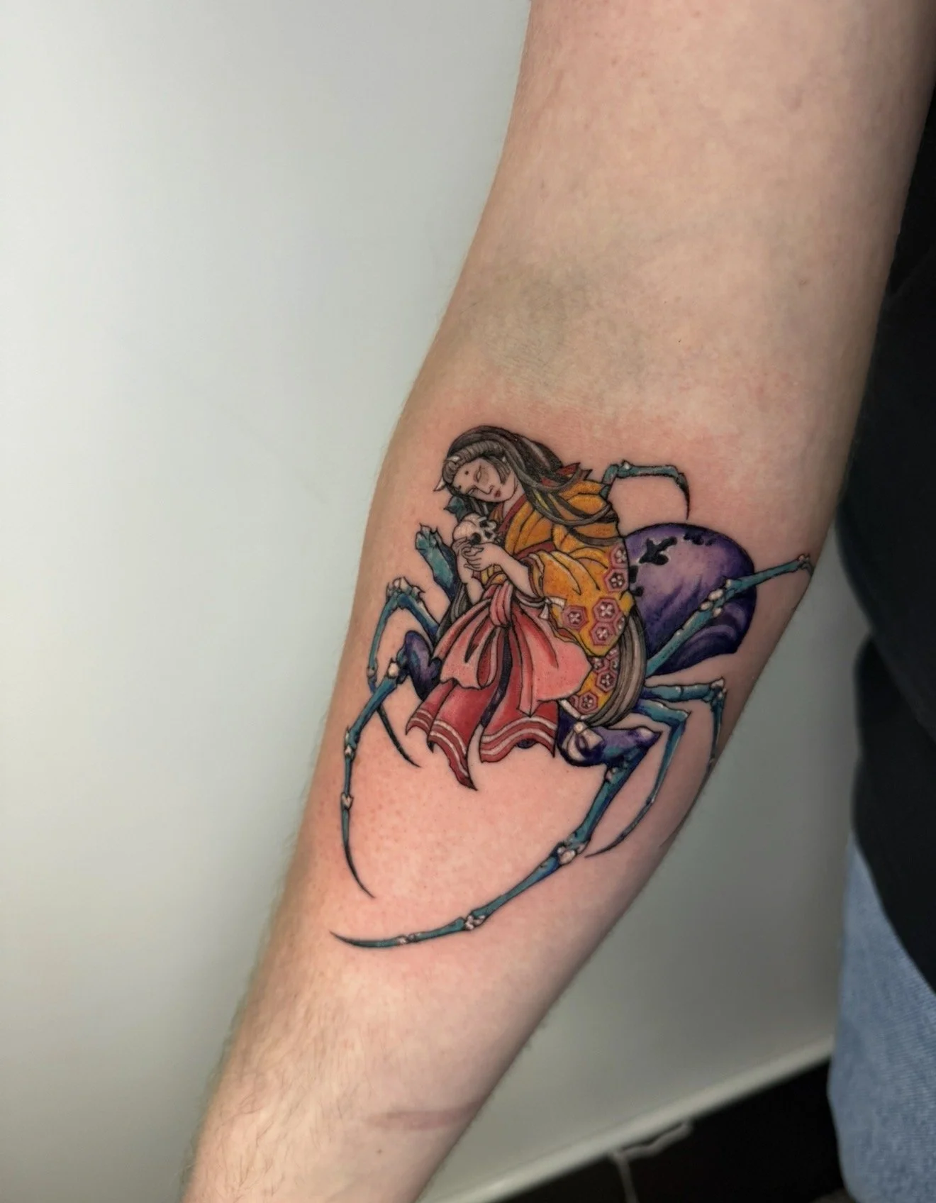 Japanese girl  spider color tattoo