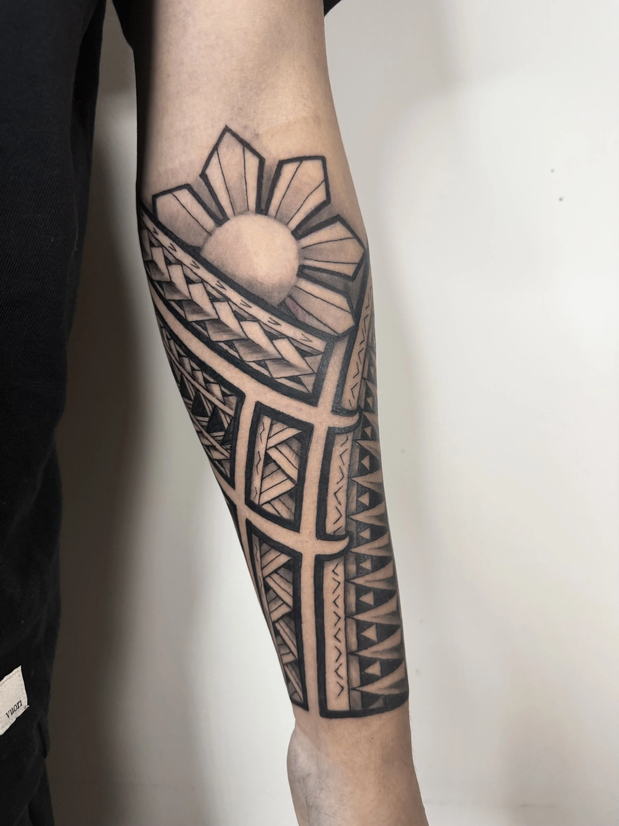 polynesian sleeve tattoo