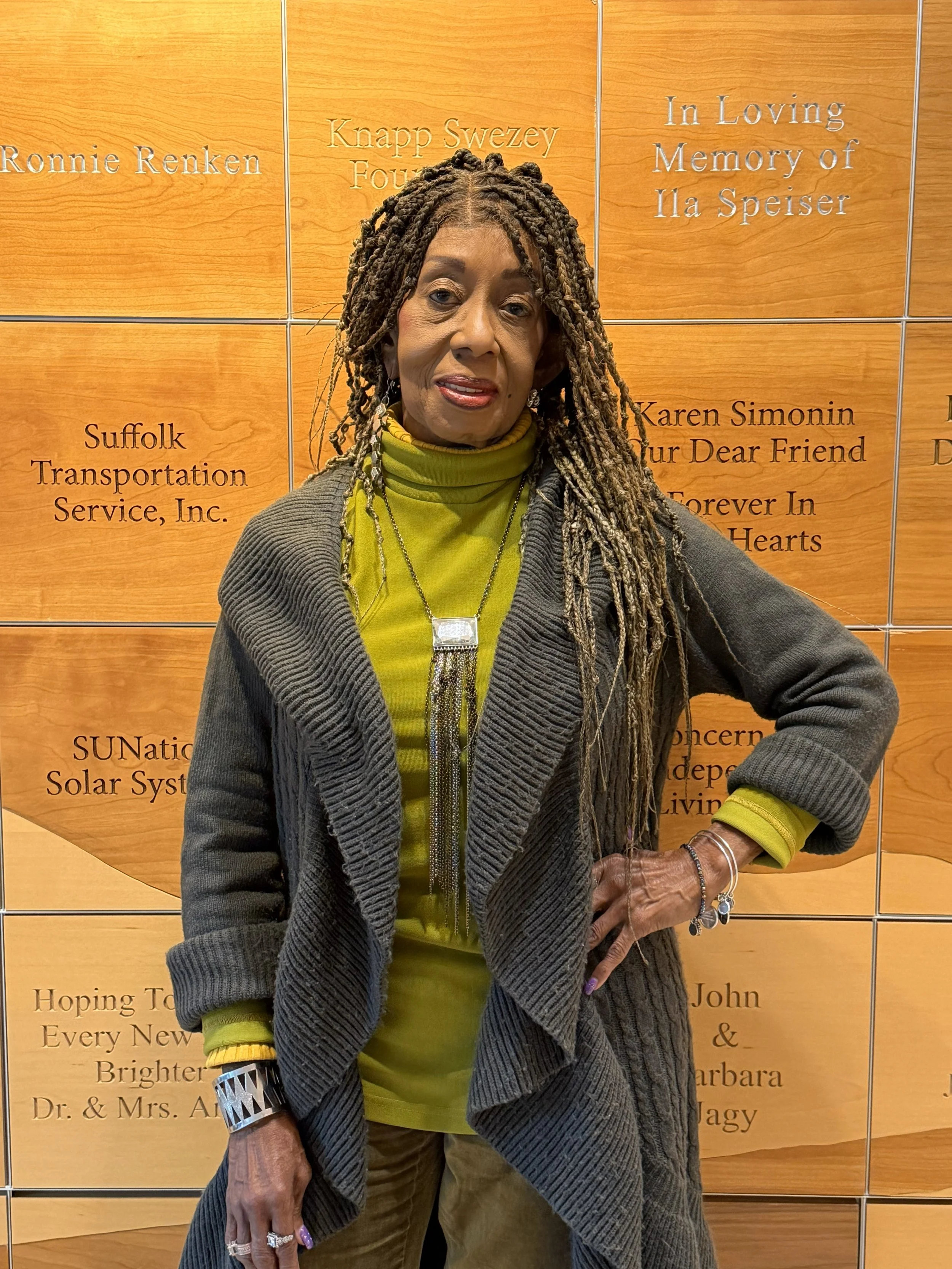 Gray user profile icon with a circular head and a rounded rectangular body on a transparent background.