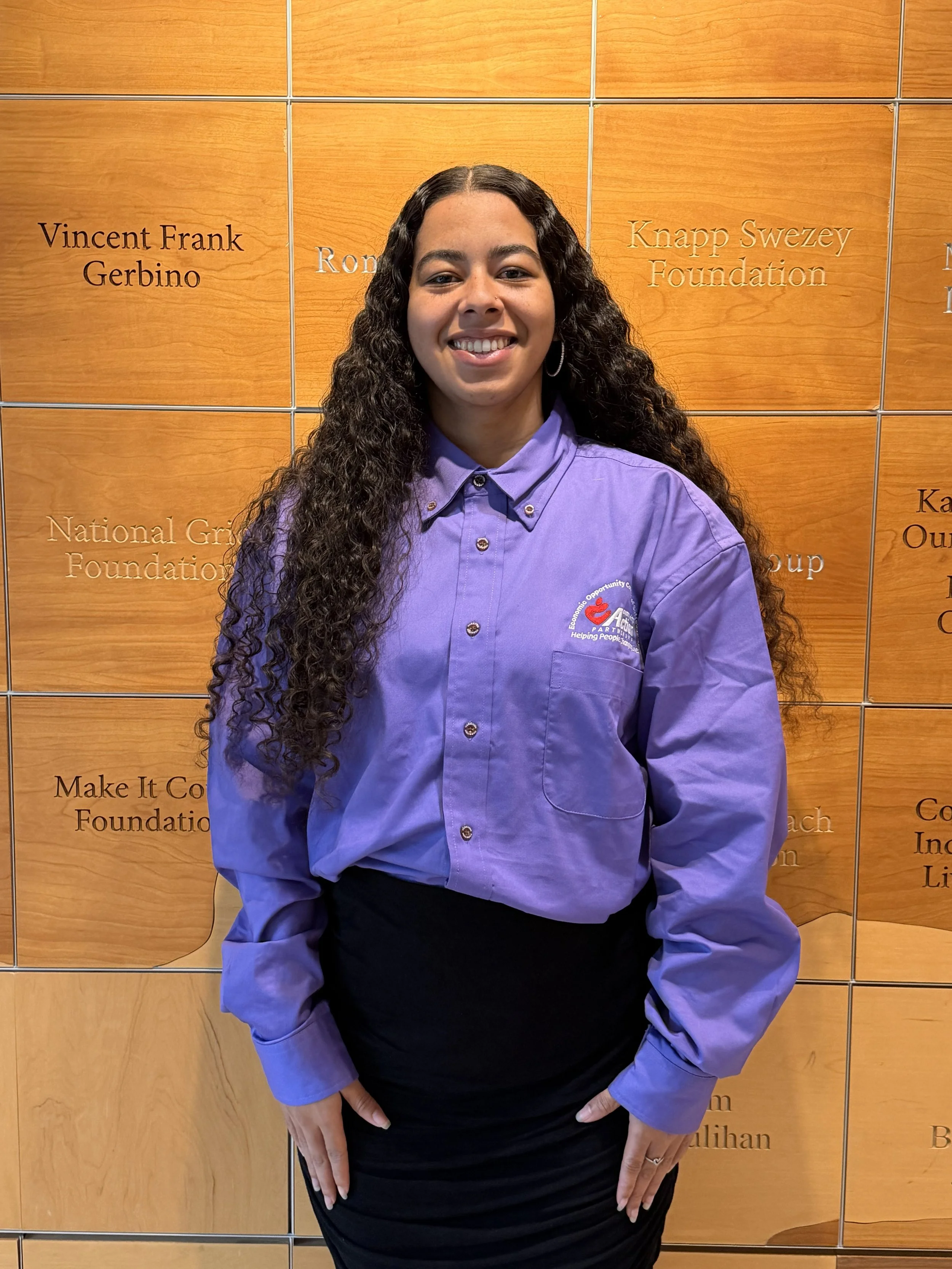 Gray silhouette of a person with a circular head and rectangular body.