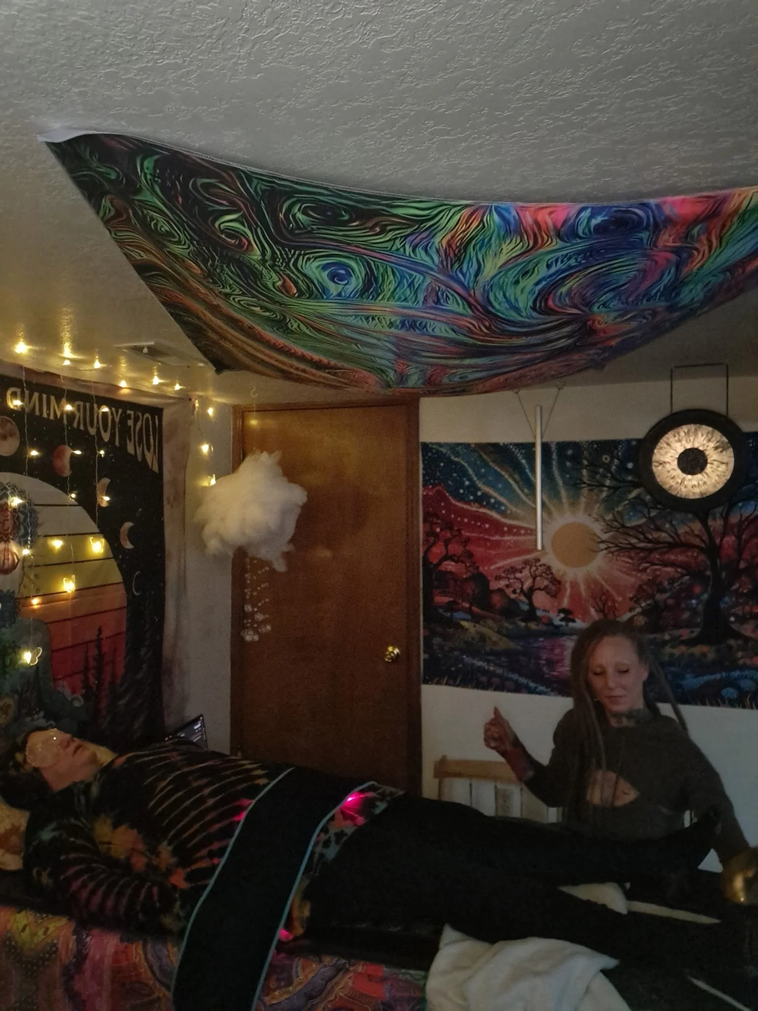 Heartbeat healing sounds healing studio, a client receiving sound thearpy.