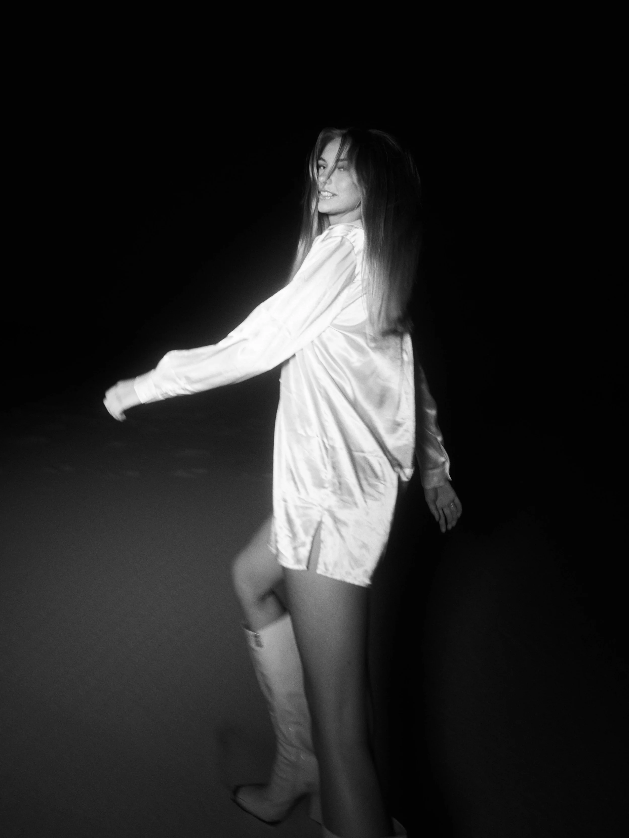 Computer monitor displaying a video editing software interface with timeline, clips, and editing tools.