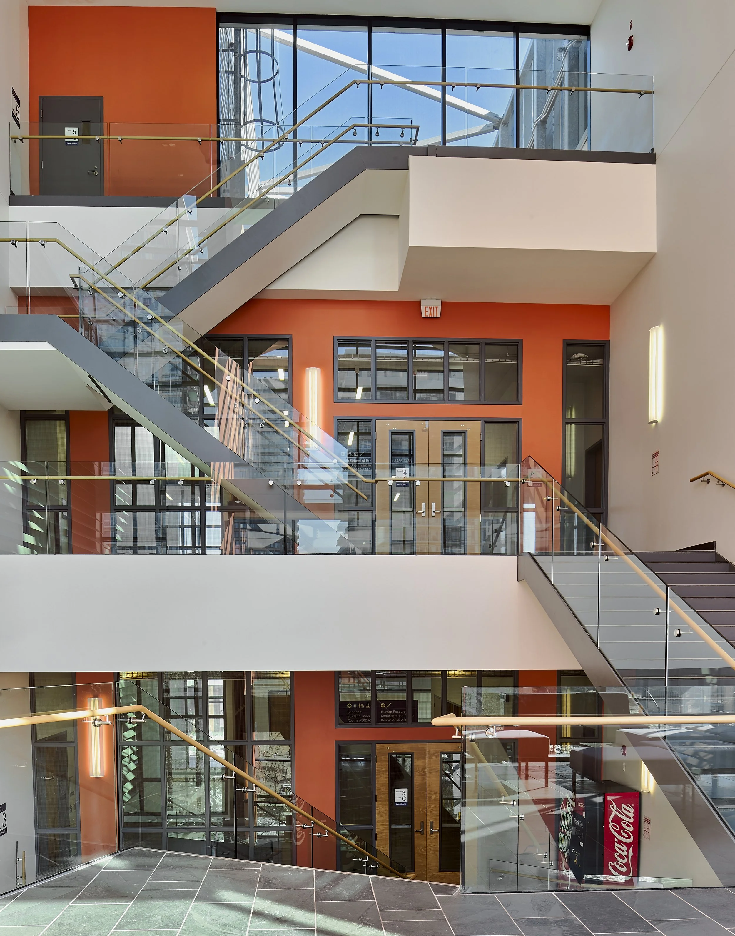 Multi-storey architectural staircase photographed by Obscura Dreams