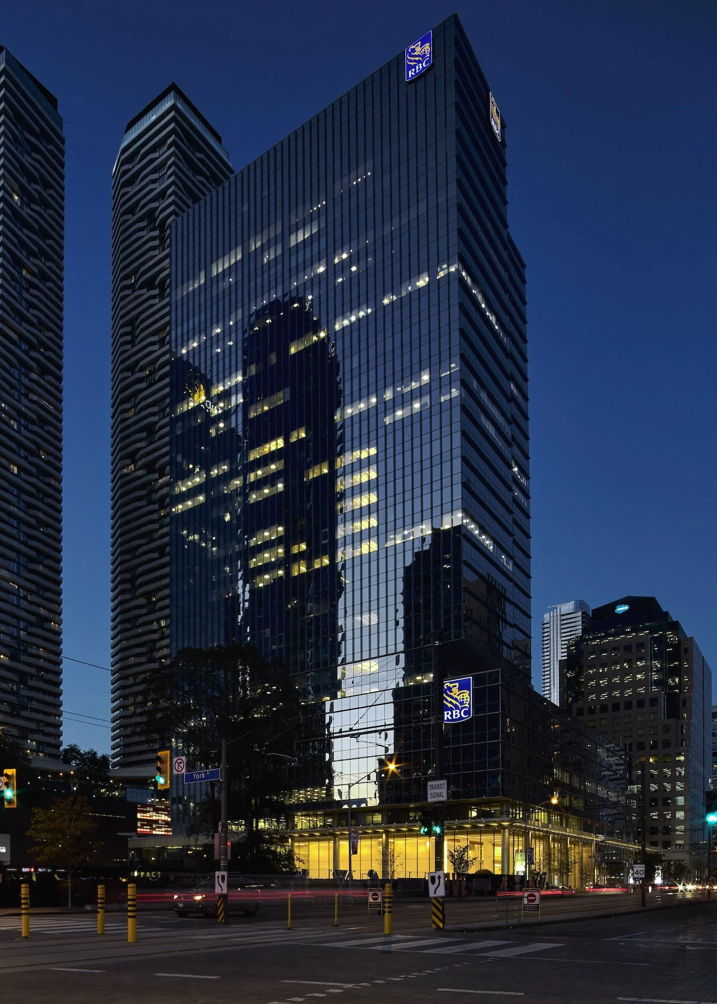 Night architectural photograph of a lit RBC tower against the city skyline