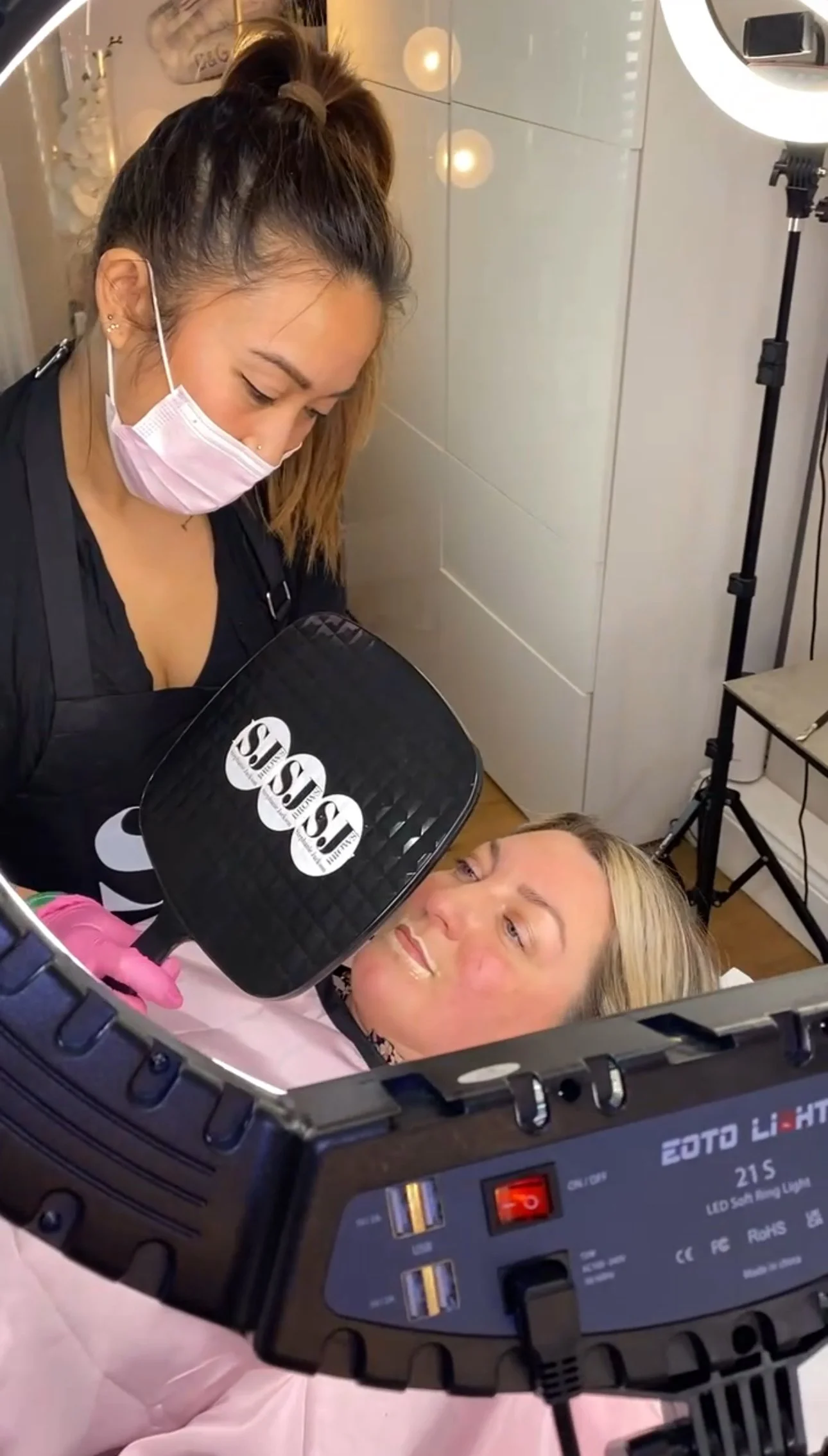 Permanent makeup artist performing lip blush cosmetic tattoo procedure on client at Inked Cosmetics Northern Virginia Great Falls VA