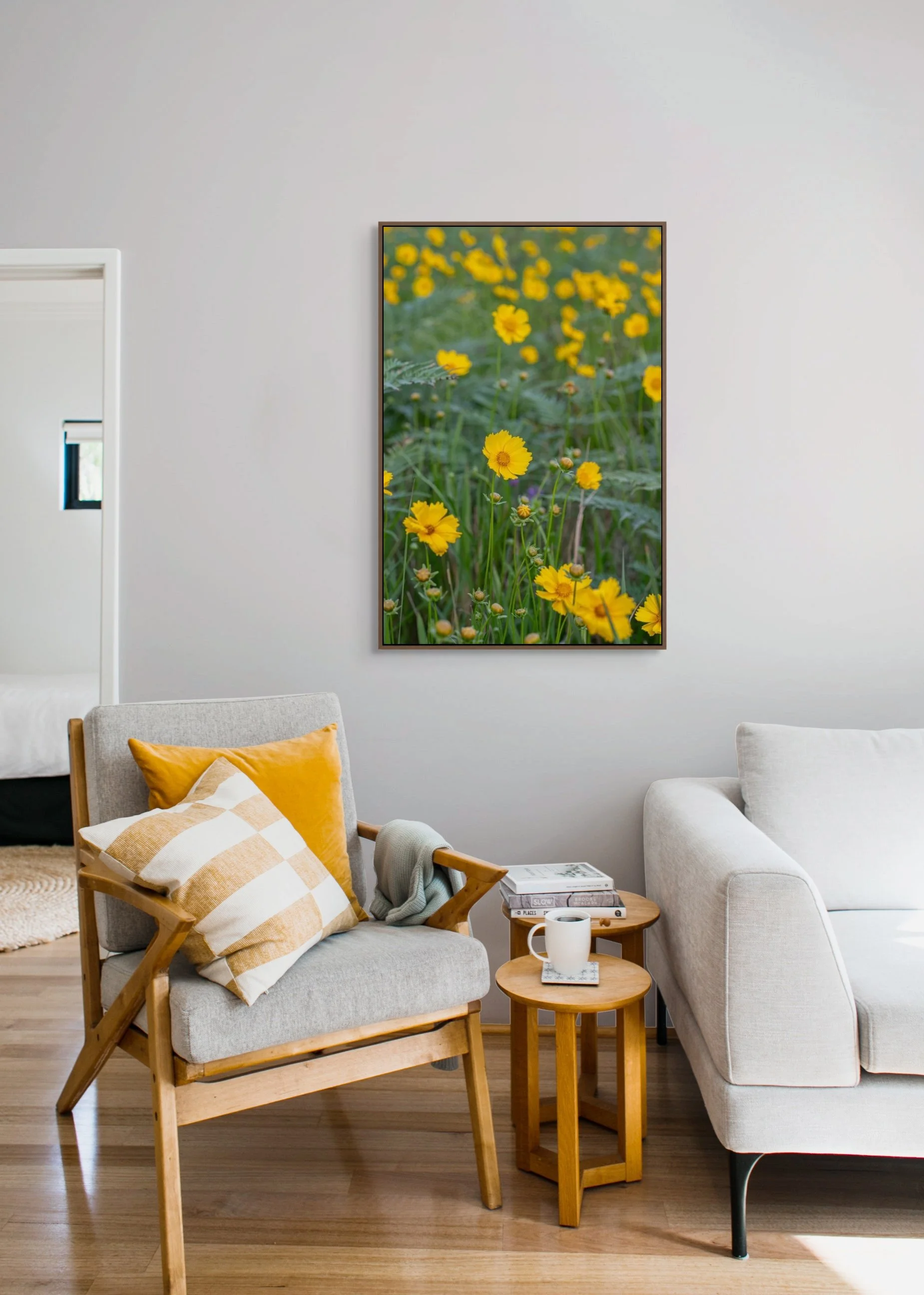 Yellow wildflowers blooming in a soft green meadow botanical landscape.