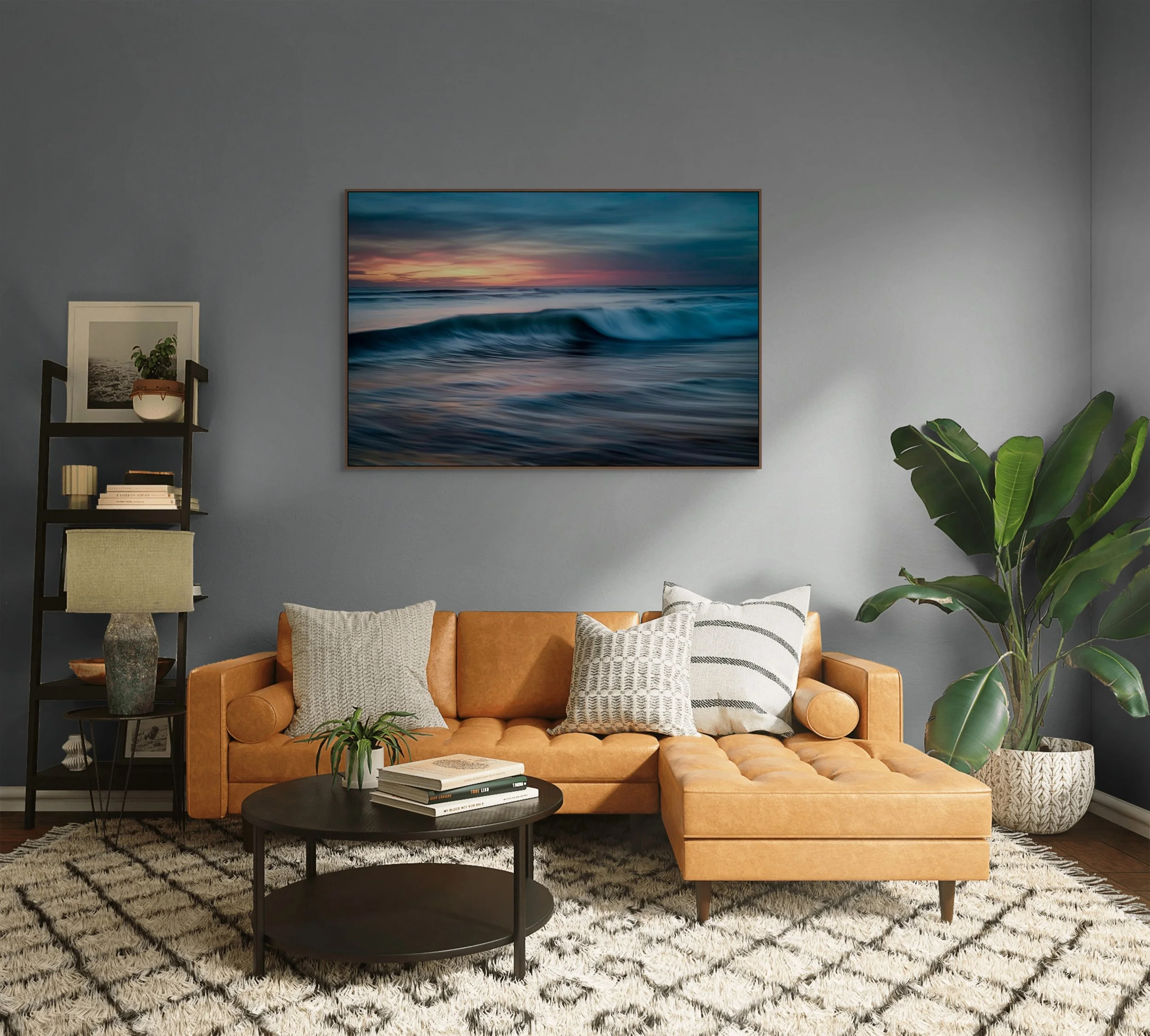 Ocean wave rolling at sunset with soft pink and blue sky reflections.