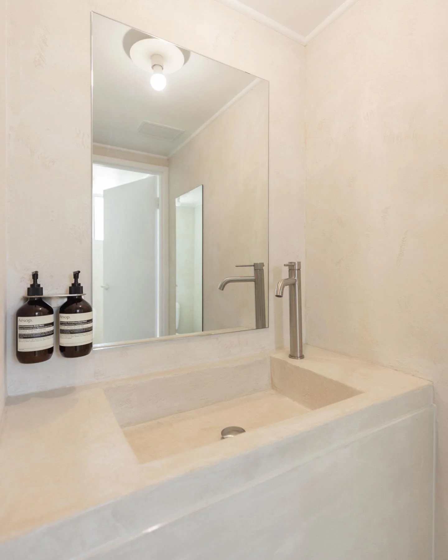 Elevated essentials 🙌🏻 Our rendered sink in our restroom says it all!