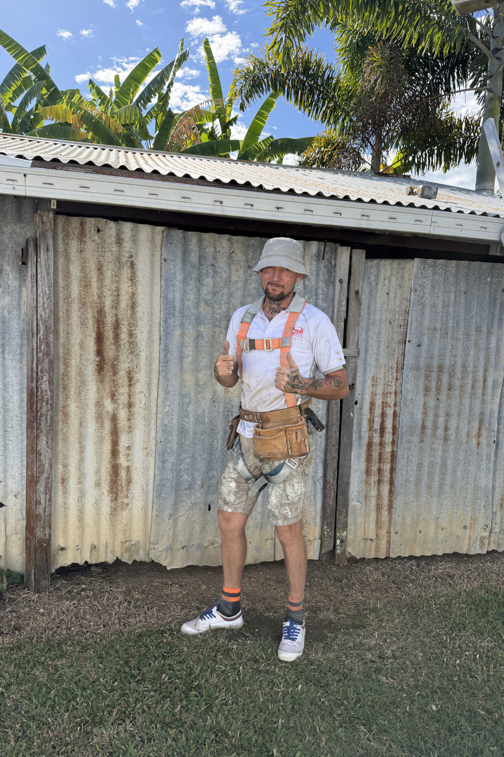 Alfie Hendry of Hendry’s Restorations dressed ready to paint roofs in Comet, Queensland.