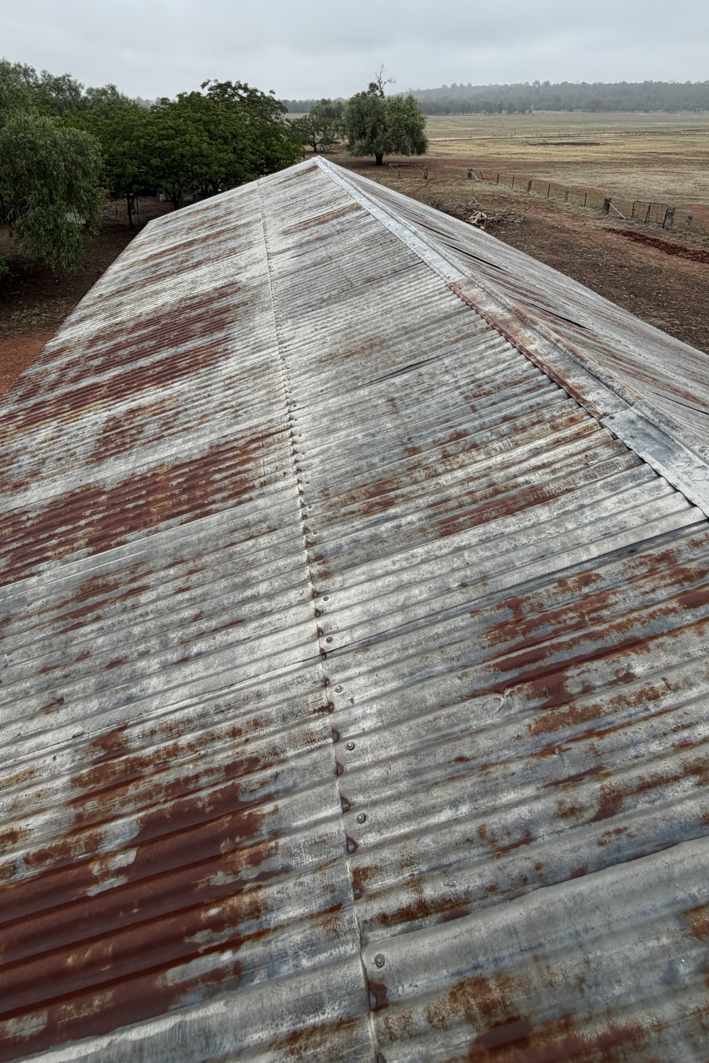 A rusty metal roof in Yuleba prior to painting.