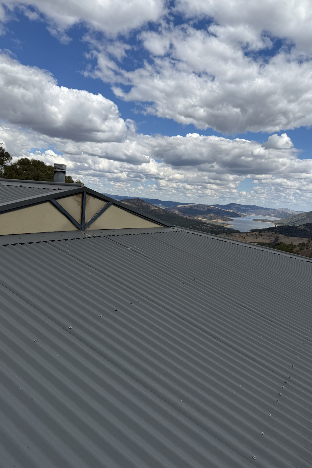 A rusty metal roof in St George prior to painting.