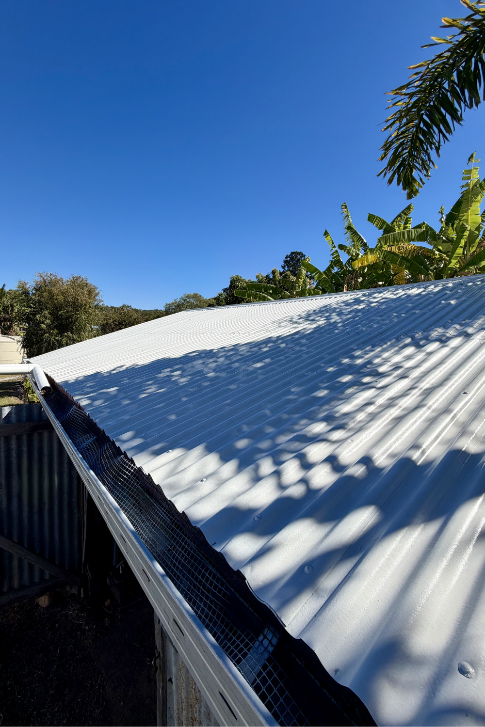 A freshly painted metal roof in Capella, Queensland after painting grey.