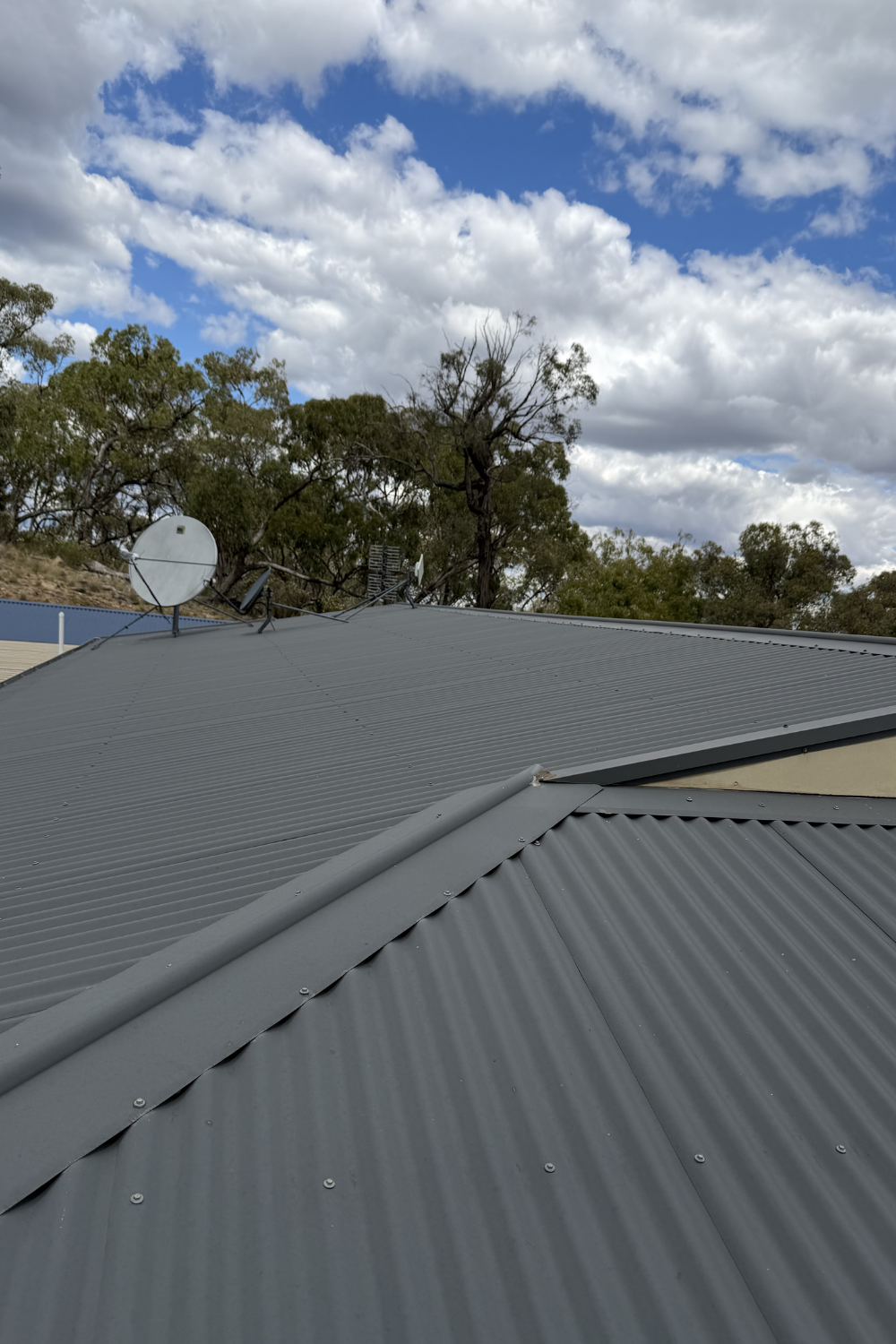 A rusty metal roof in Bollon prior to painting.