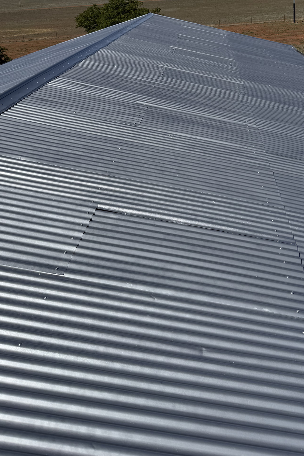 A metal roof in Dingo, Queensland which has been painted silver.