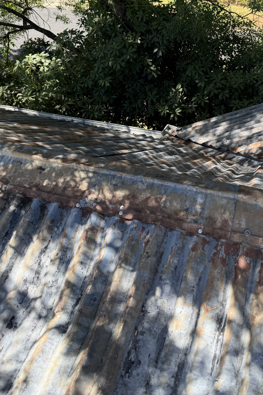 A rusty metal roof in Cracow prior to painting.