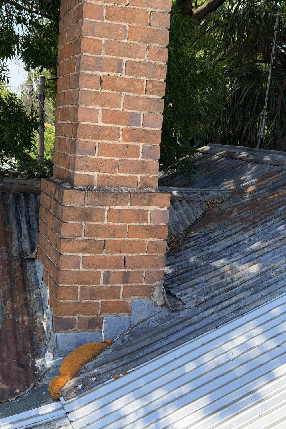 A rusty metal roof in Mungindi prior to painting.