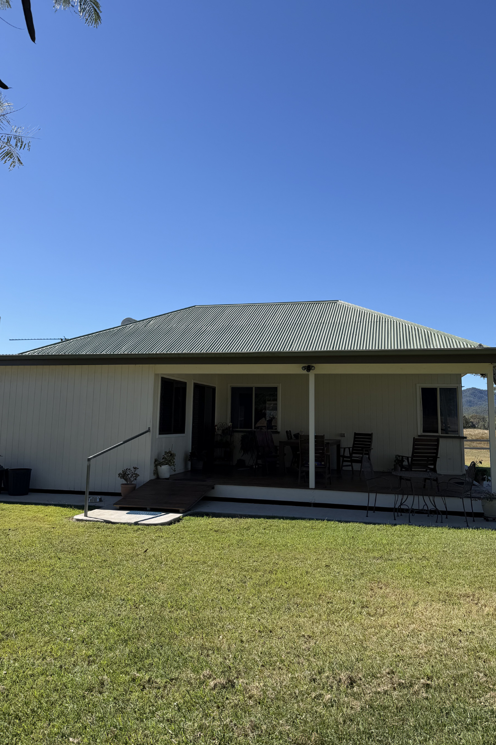 A freshly painted metal roof in Blackwater after painting green.