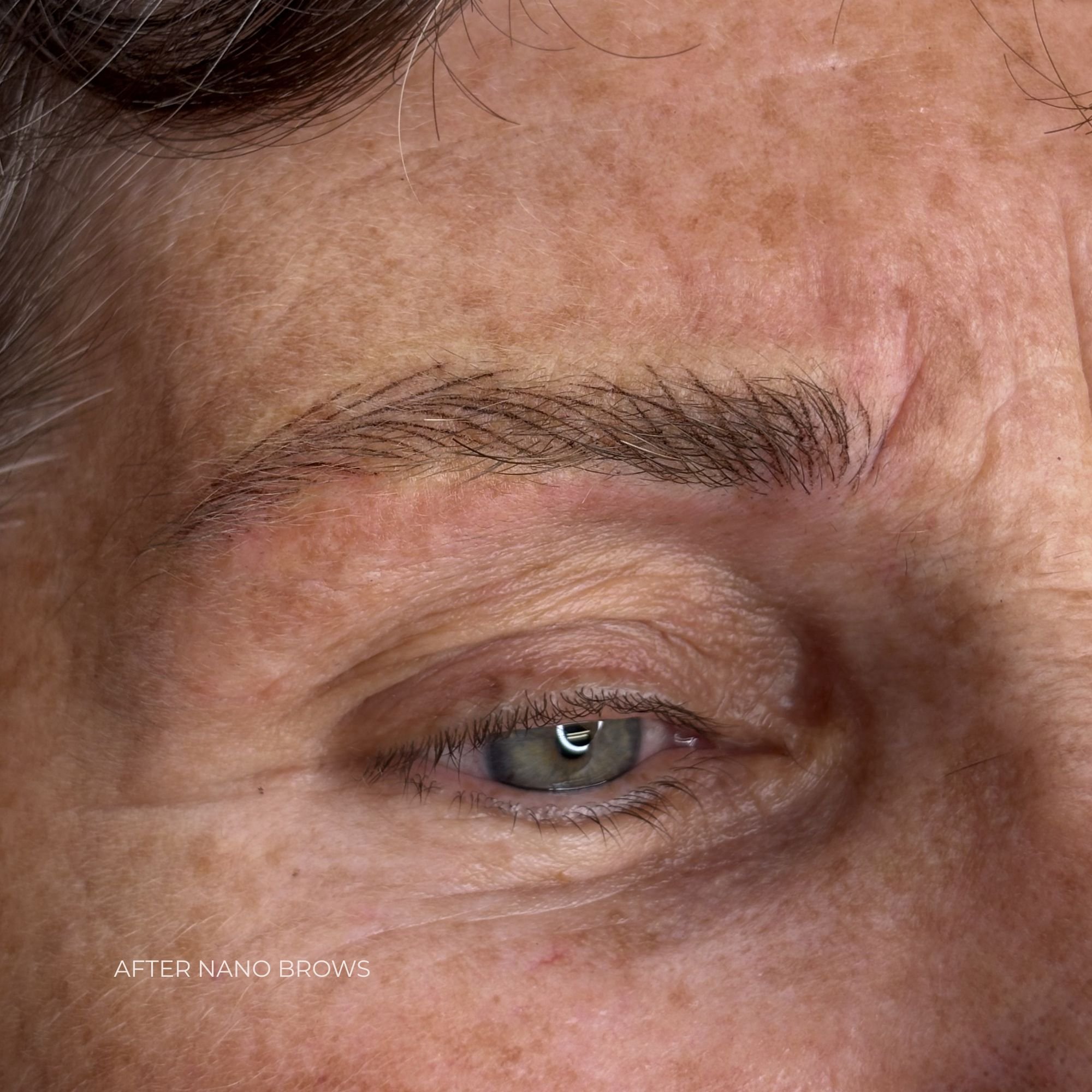 Close up of freshly tattooed, natural looking Nano Brows (Hair stroke tattoo)