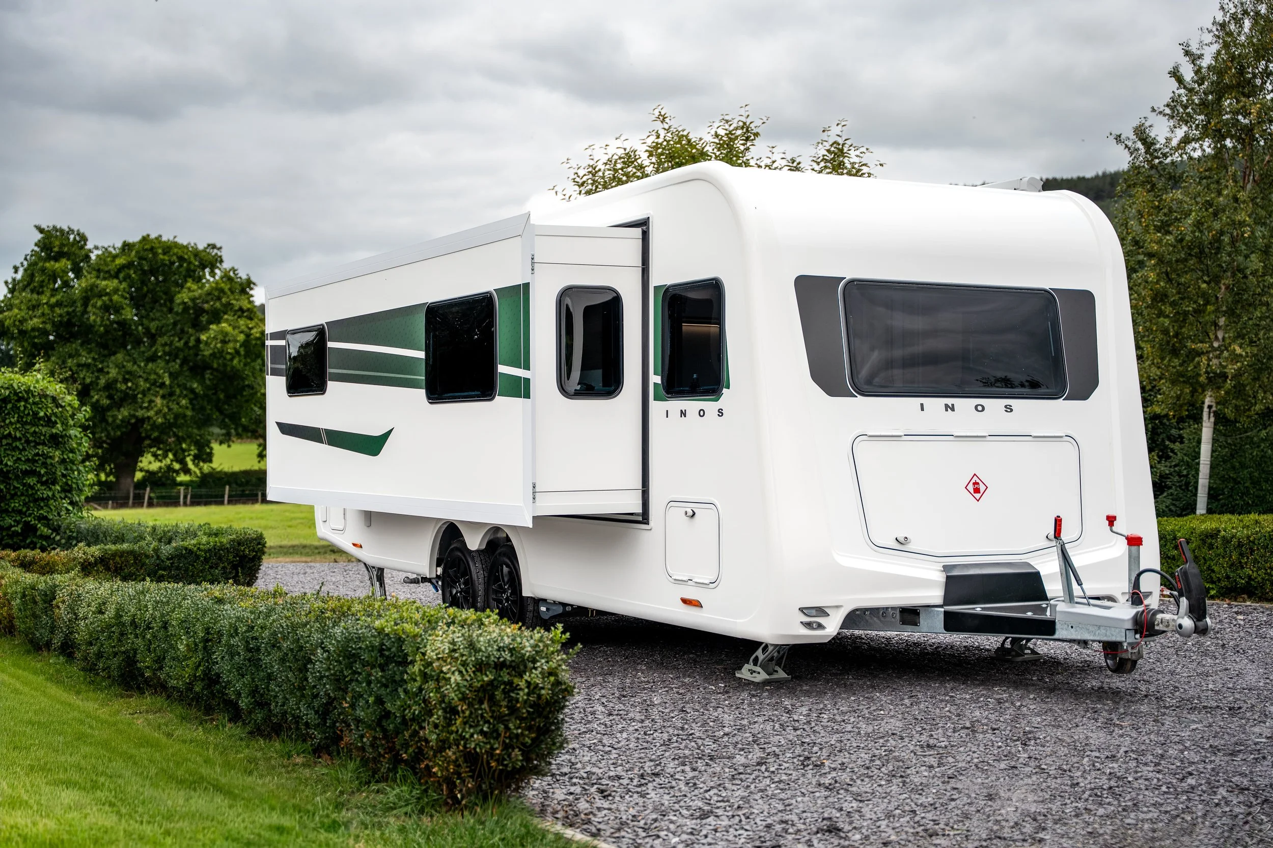 2025 INOS Caravan by Fifth Wheel_exterior_slideout_wide.jpg