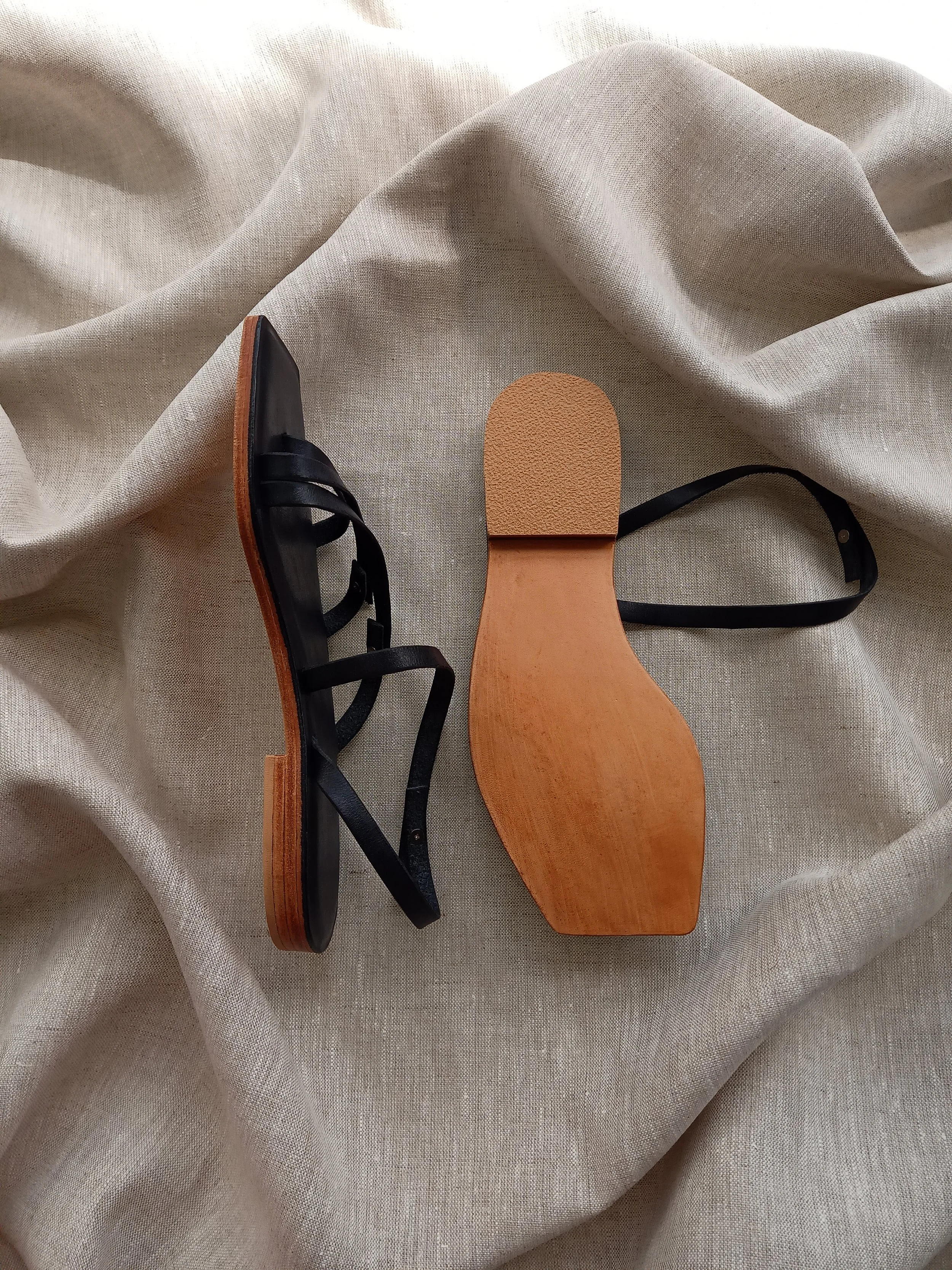 Leather upper, leather & cork midsole, leather sole, rubber heel grip