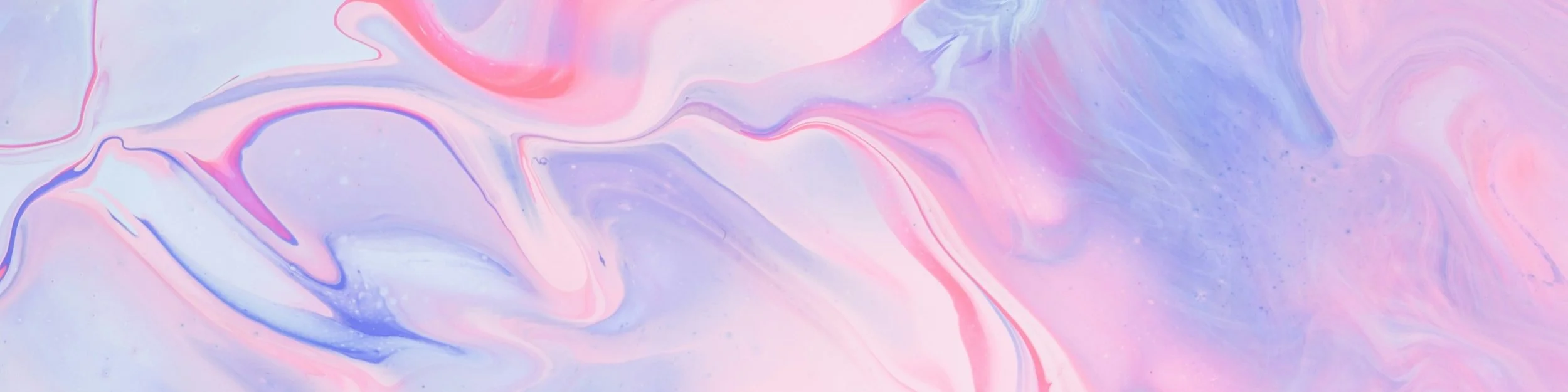 Un fond abstrait de marbrure avec des couleurs pastel roses, violettes et bleues