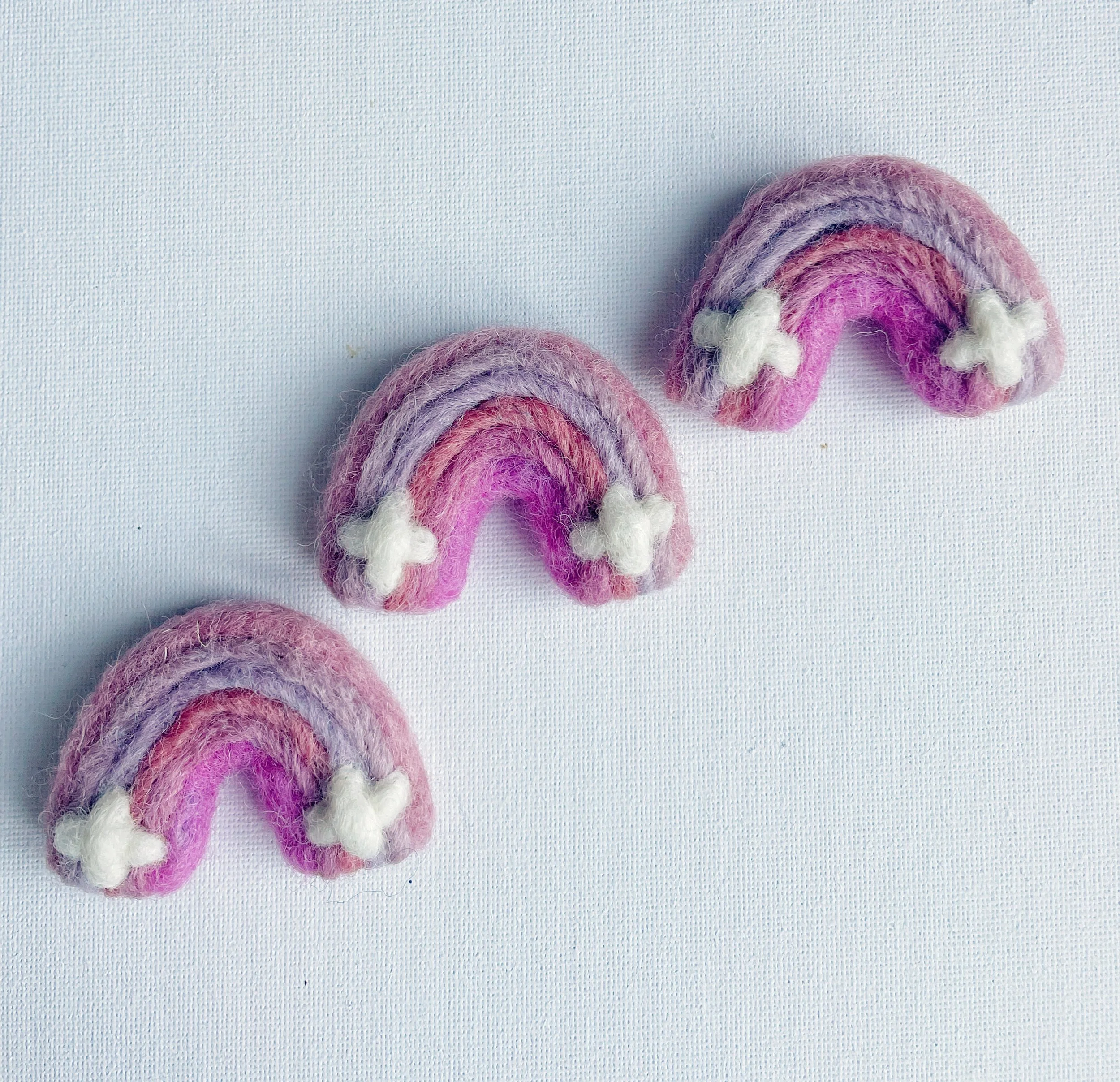 100% Wool-Felted Rainbow with Clouds approx: 4.5cm x 5.5cm Pinks, 1 count
