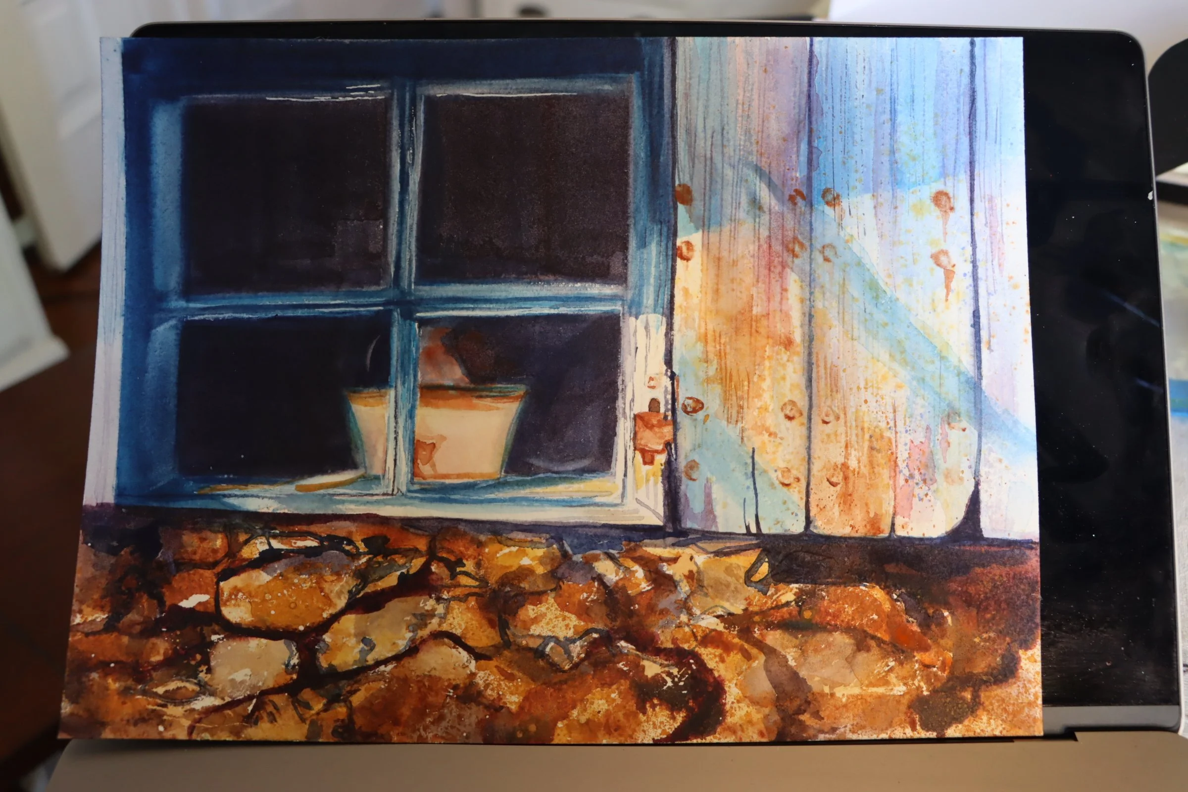 Watercolor painting of a door and window with pots on the windowsill, set on a stone ledge, painted in soft blues, oranges, and browns.