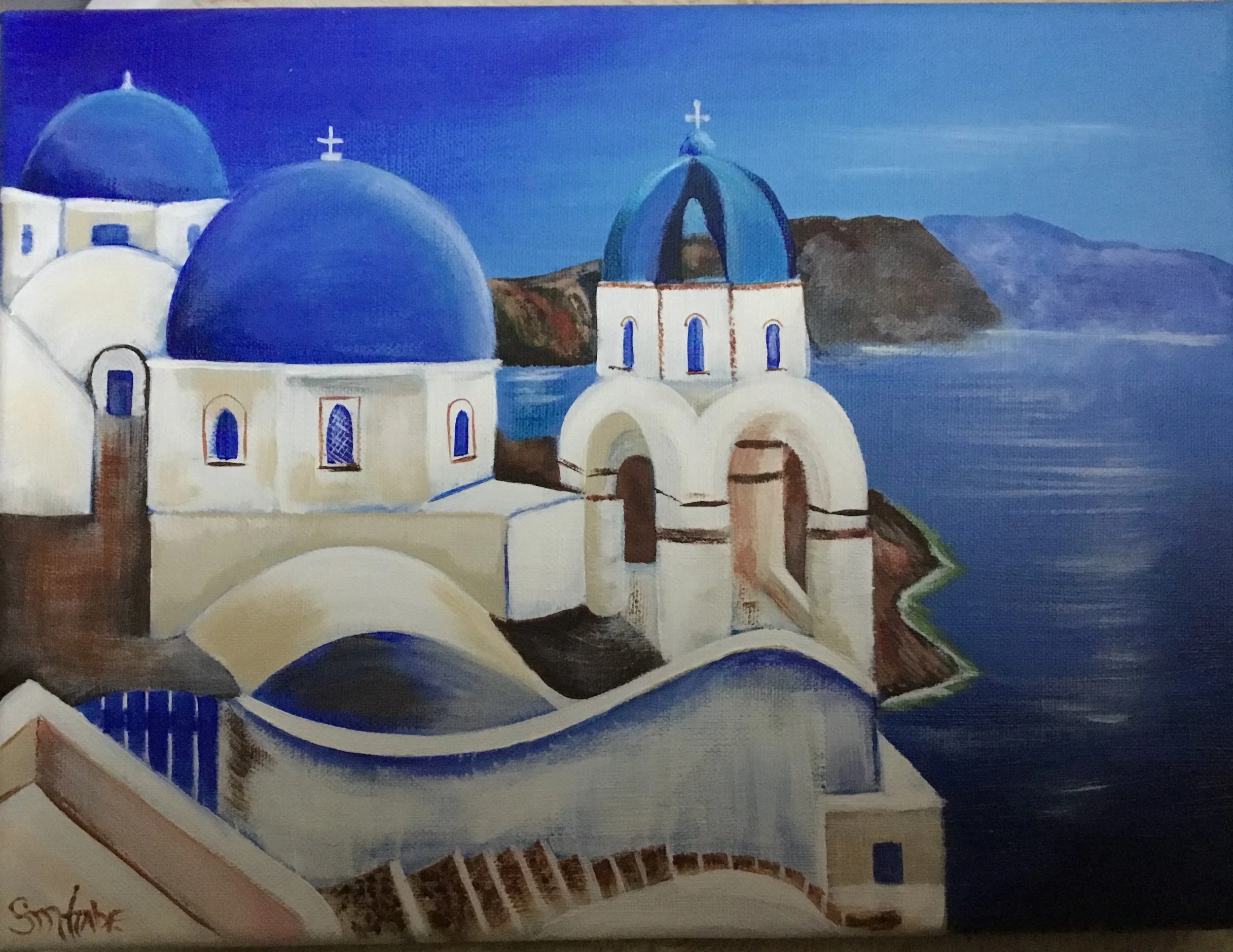 A painting of white and blue buildings with domed roofs and crosses on top, set against a blue sky and distant mountains.